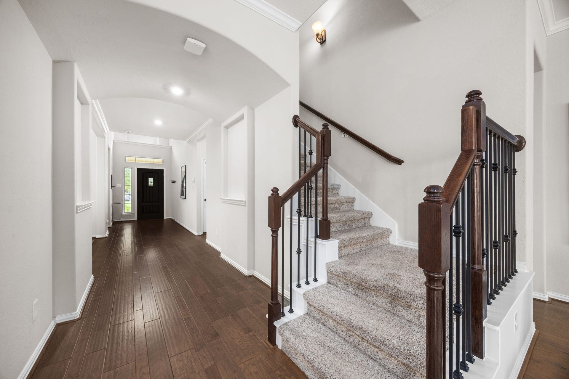 Looking from the large living area back at the front door.