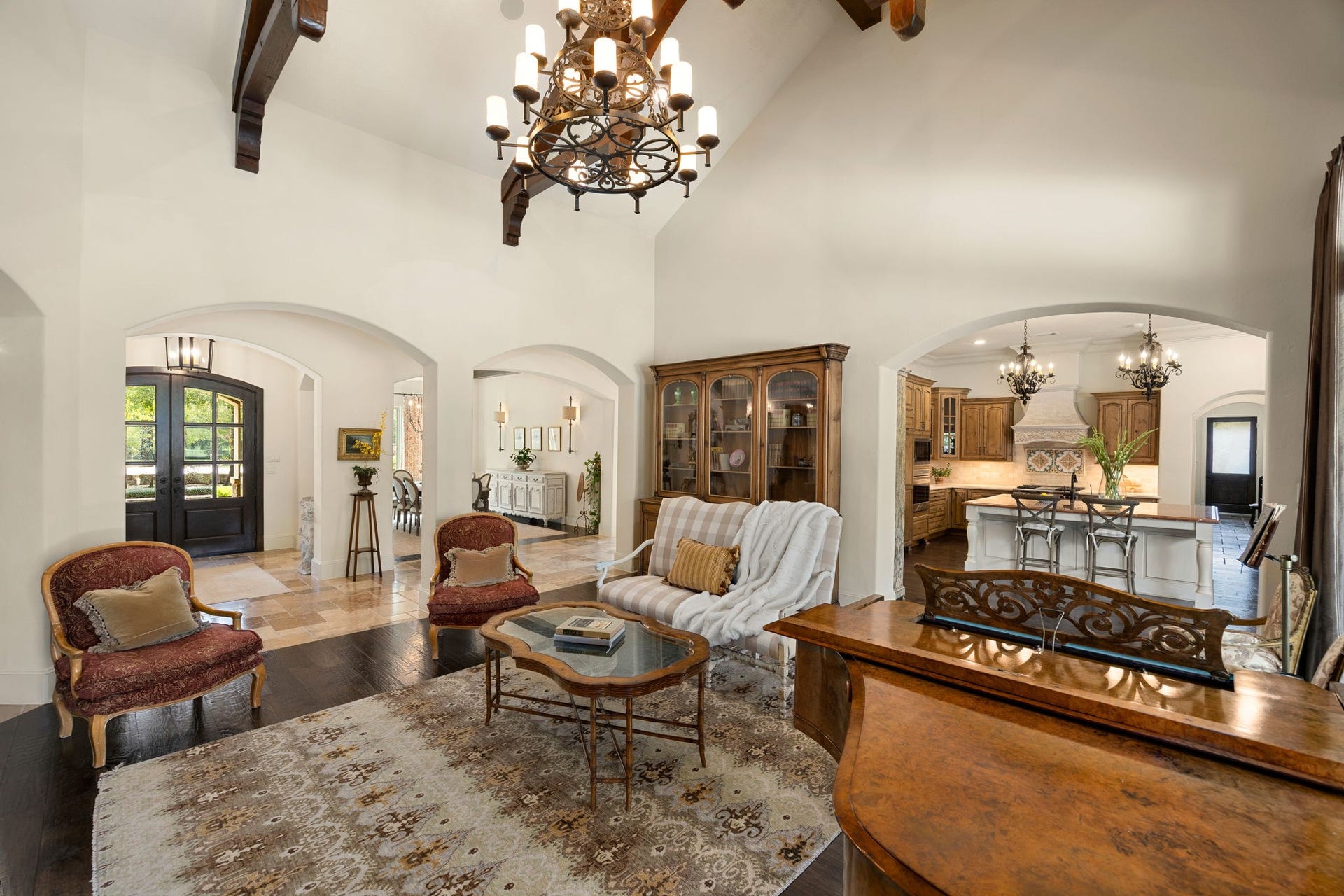 2127 Fawn Meadow Lane, Richmond, TX 77406 Another view of the inviting living room with beautiful finishes and abundant natural light and easy access to the formal dining and kitchen.