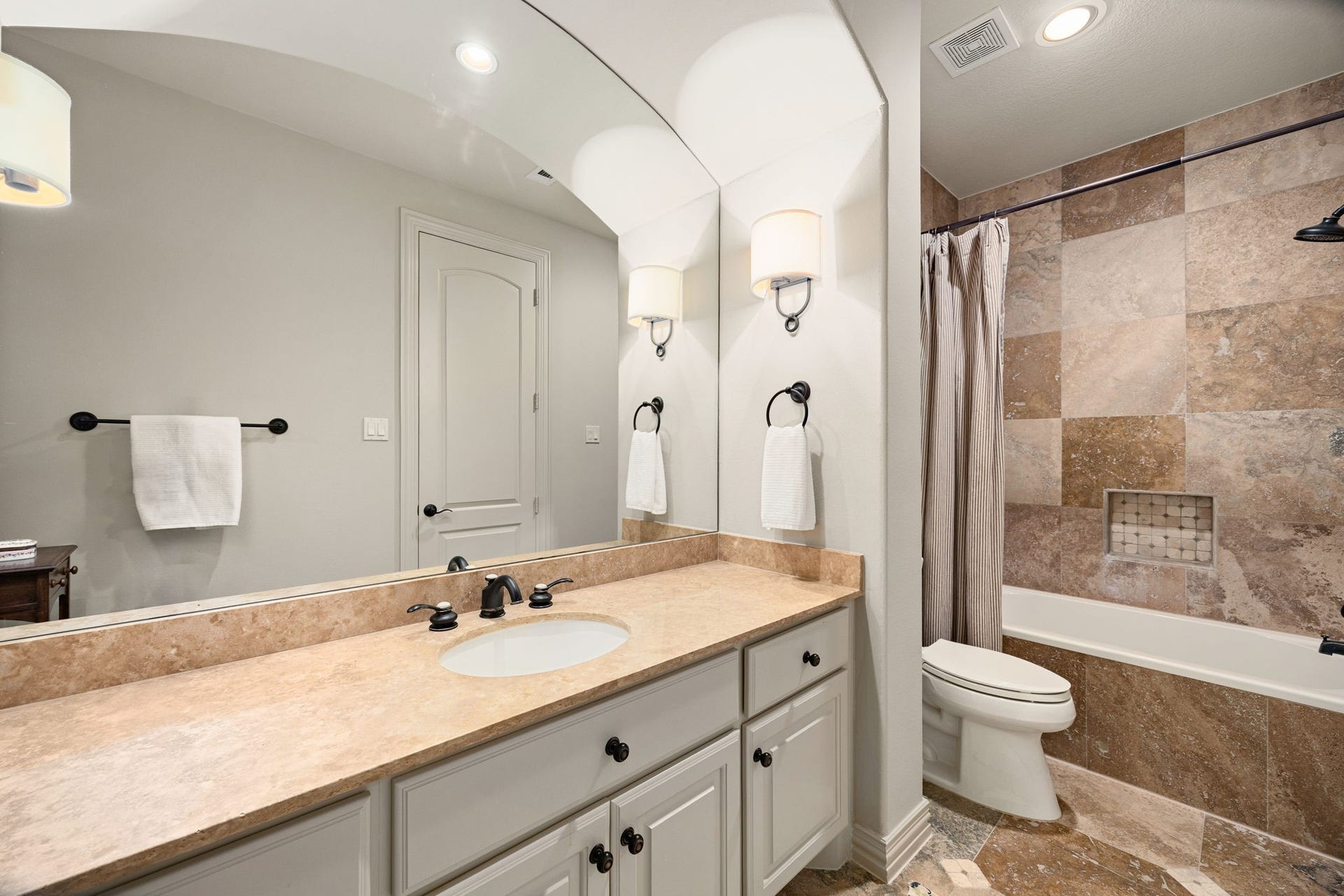 2127 Fawn Meadow Lane, Richmond, TX 77406 Beautiful bathroom with a large vanity and decorative lighting.