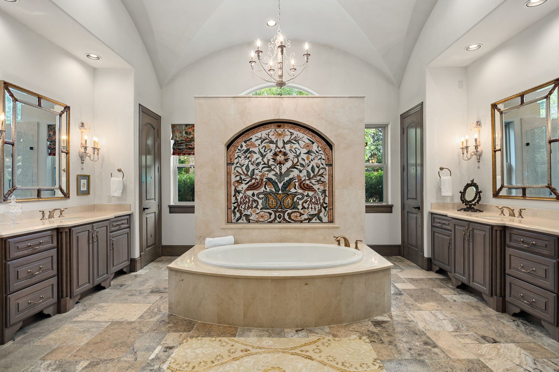 2127 Fawn Meadow Lane, Richmond, TX 77406 Luxurious primary en-suite bathroom featuring a freestanding soaking tub, custom lighting and mirrors, dual vanities, and elegant finishes.