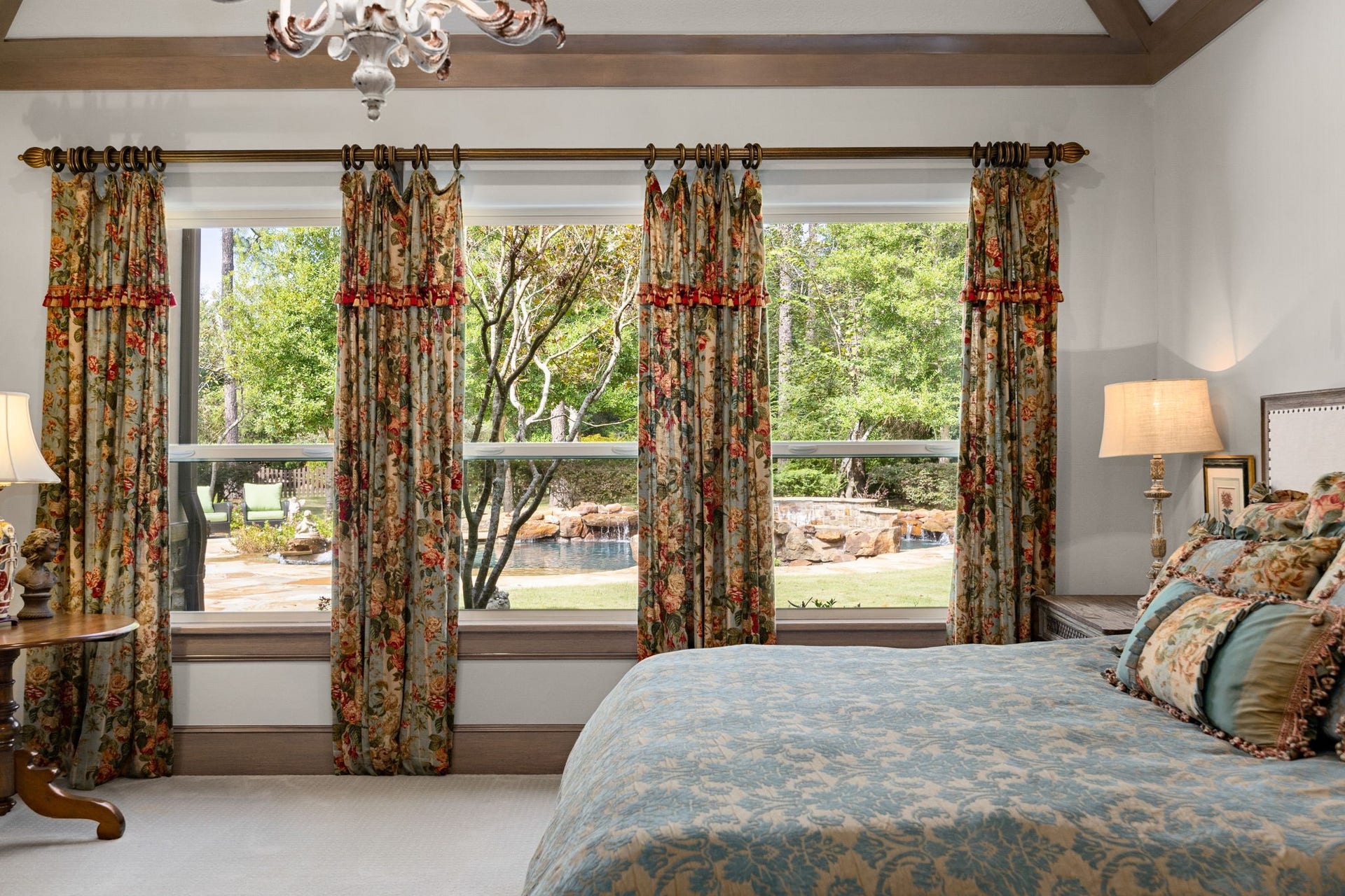 2127 Fawn Meadow Lane, Richmond, TX 77406 Additional view of the primary suite with beautiful windows overlooking the pool and greenery.