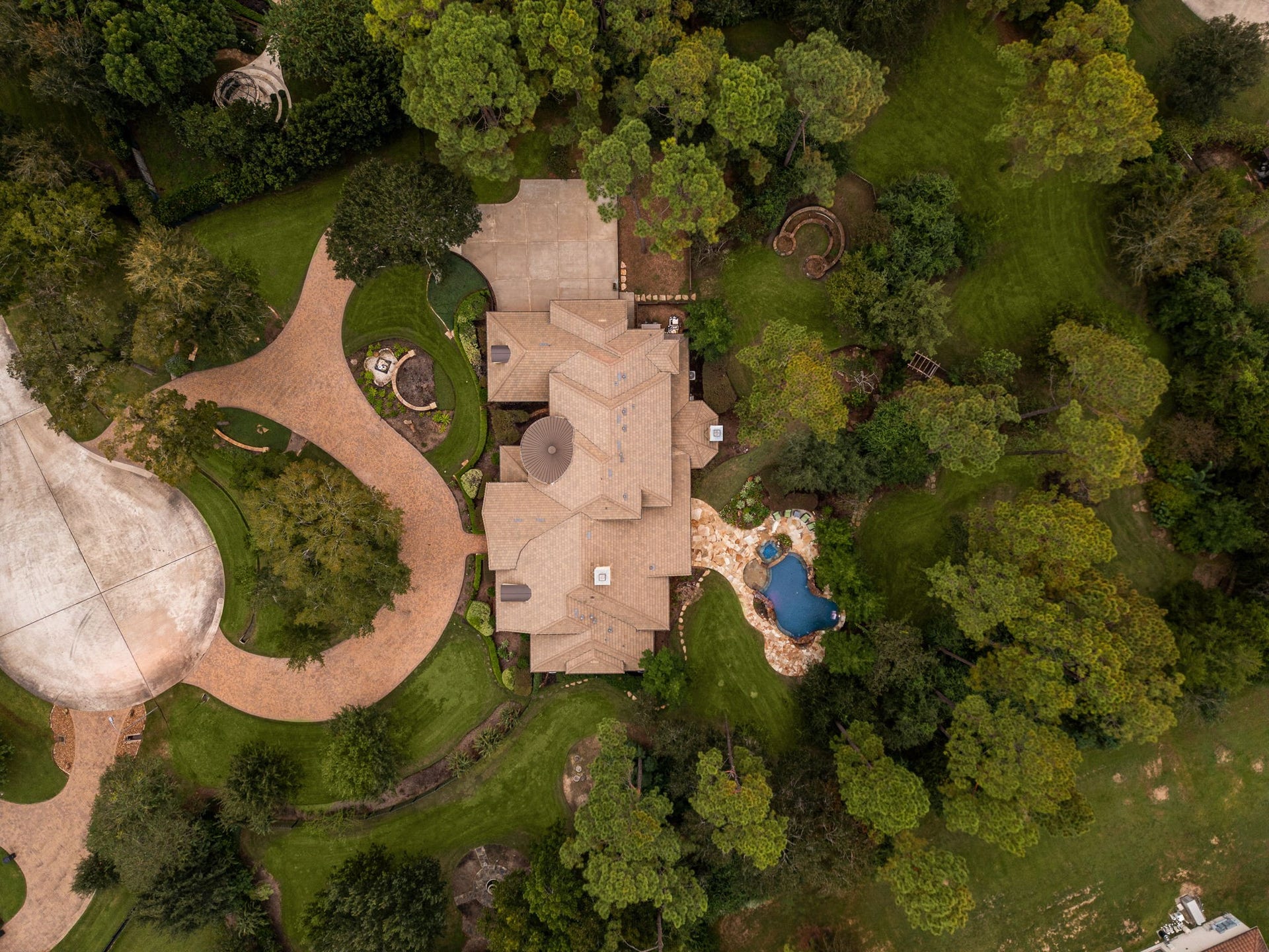 2127 Fawn Meadow Lane, Richmond, TX 77406 Overhead aerial view highlighting the property's location at the end of the cul-de-sac, circle driveway, and the abundant surrounding trees.