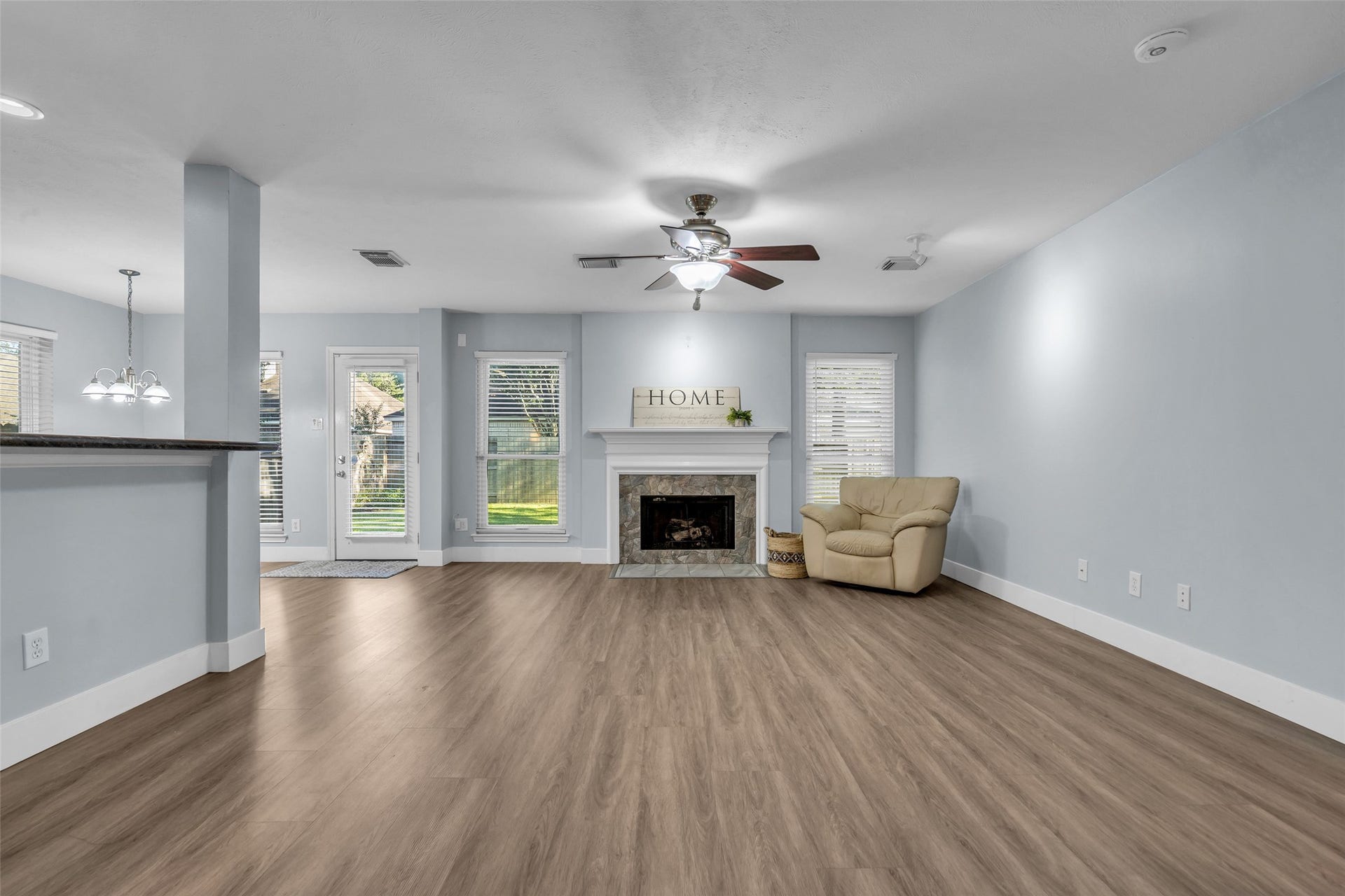 12722 Wolf Creek Court, Humble, TX 77346 Opens to Family room with gas log fireplace