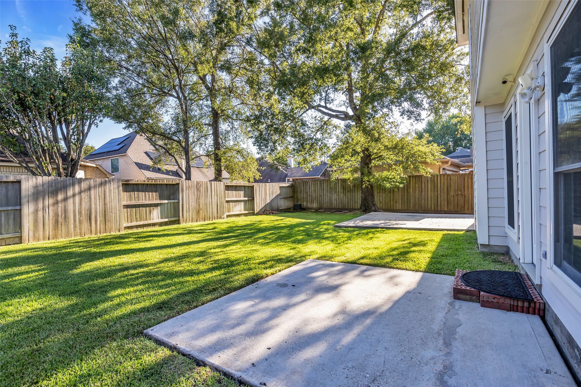 12722 Wolf Creek Court, Humble, TX 77346 2 concrete pads to add furniture or a pergola