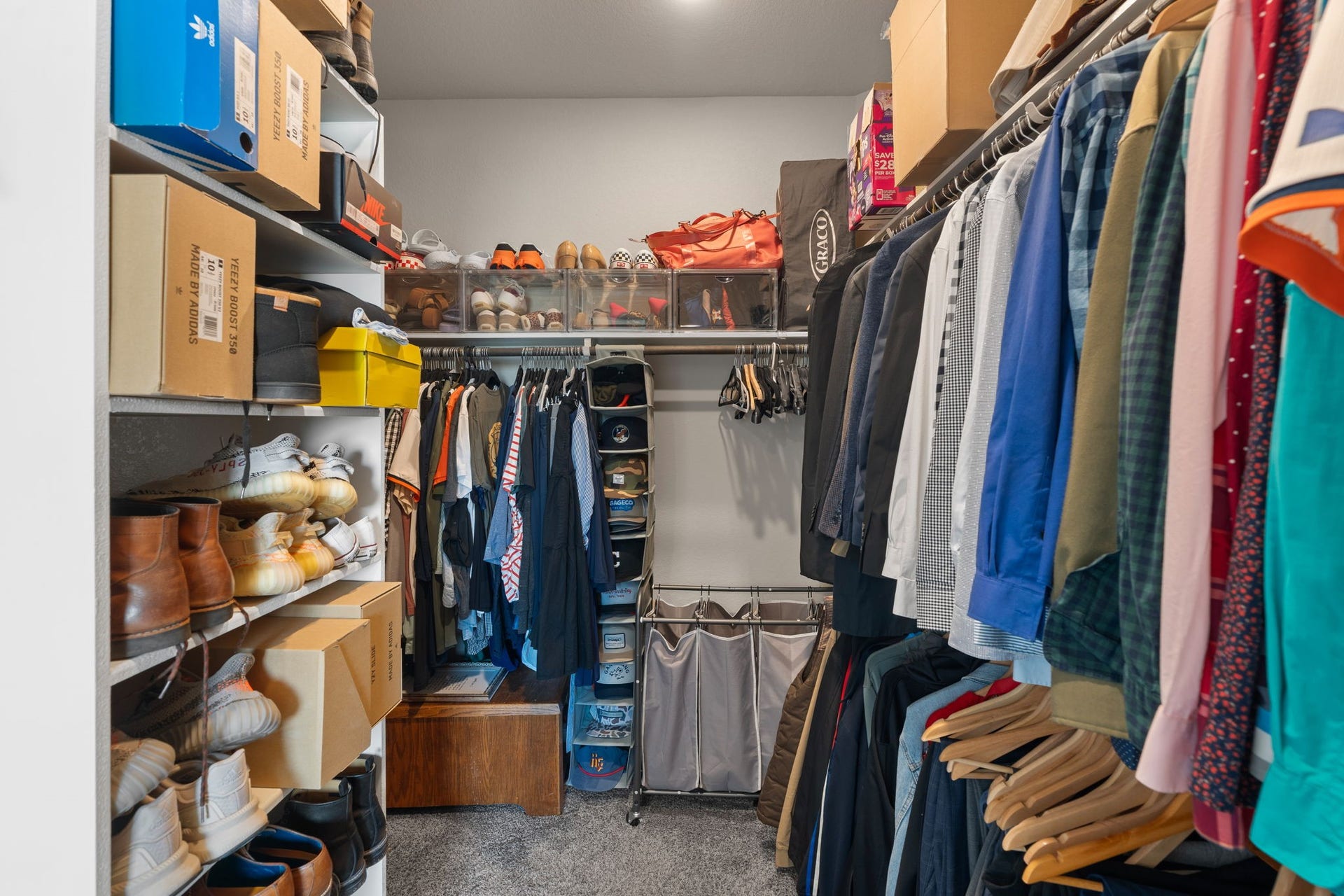 23418 Tirino Shores Drive, Katy, TX 77493 Spacious master closet allows you to store your wardrobe with ease.