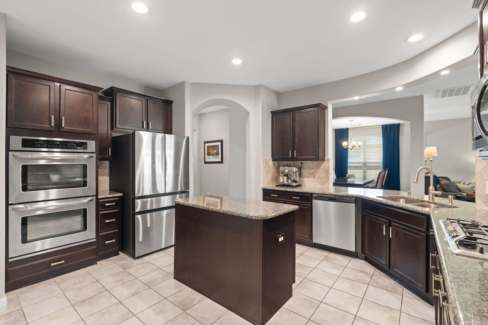 23418 Tirino Shores Drive, Katy, TX 77493 Cooking and serving is a breeze from the gourmet kitchen