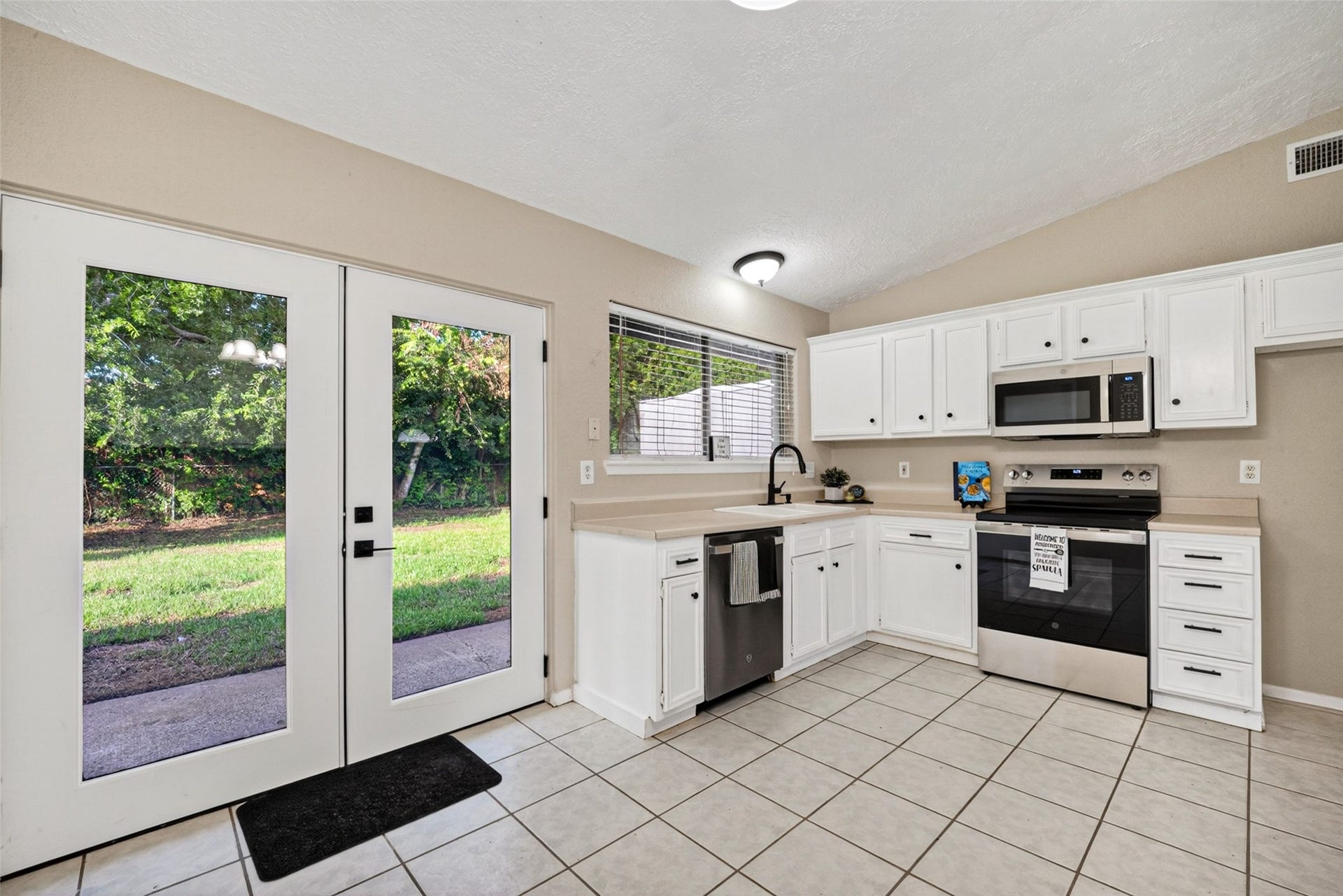 16615 Barcelona Drive, Friendswood, TX 77546 Beautiful Brand New patio doors top to bottom glass to allow the natural light to come in