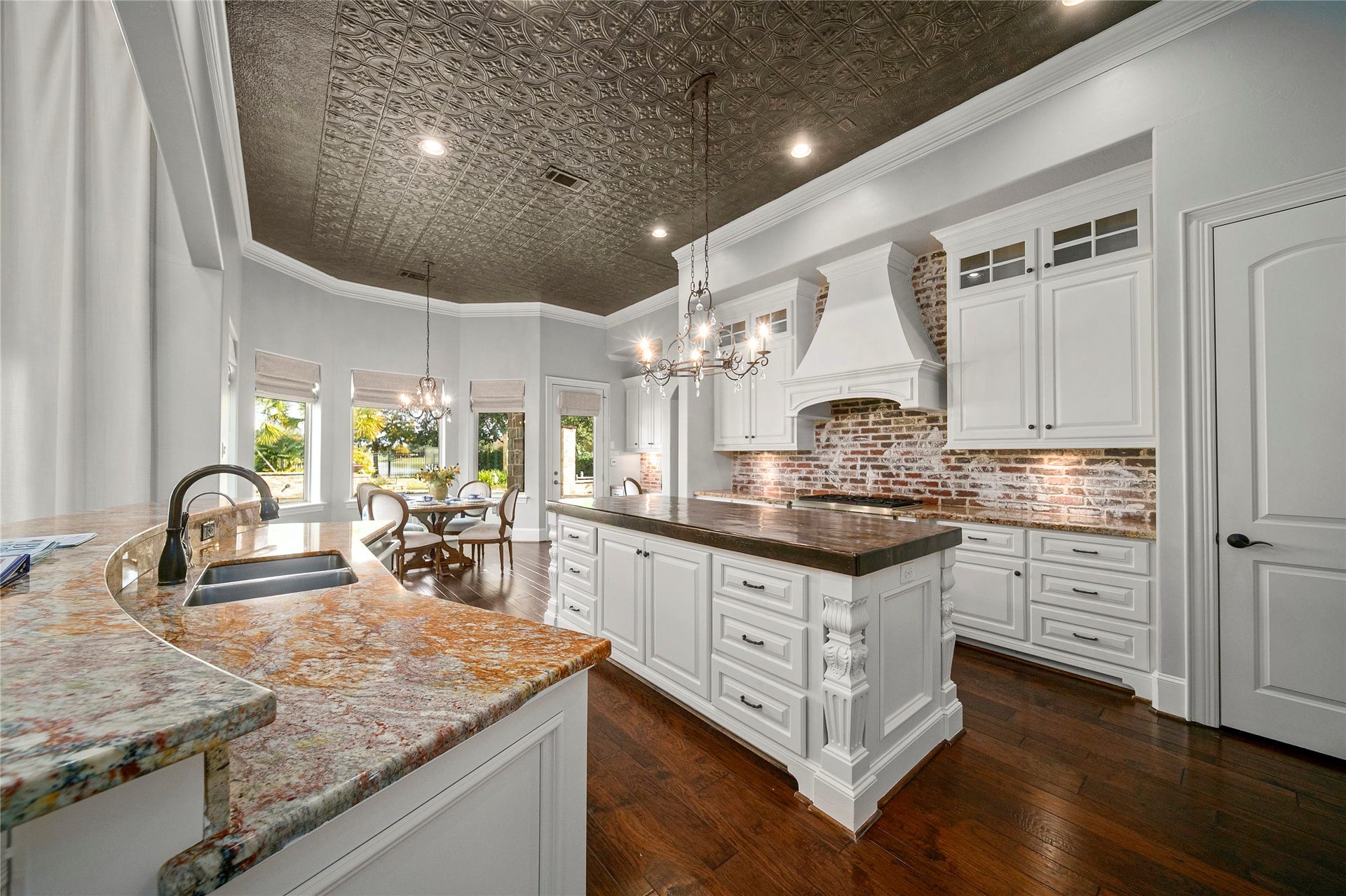 10506 Pebblecreek Crossing, Katy, TX 77494 Kitchen island and open layout.