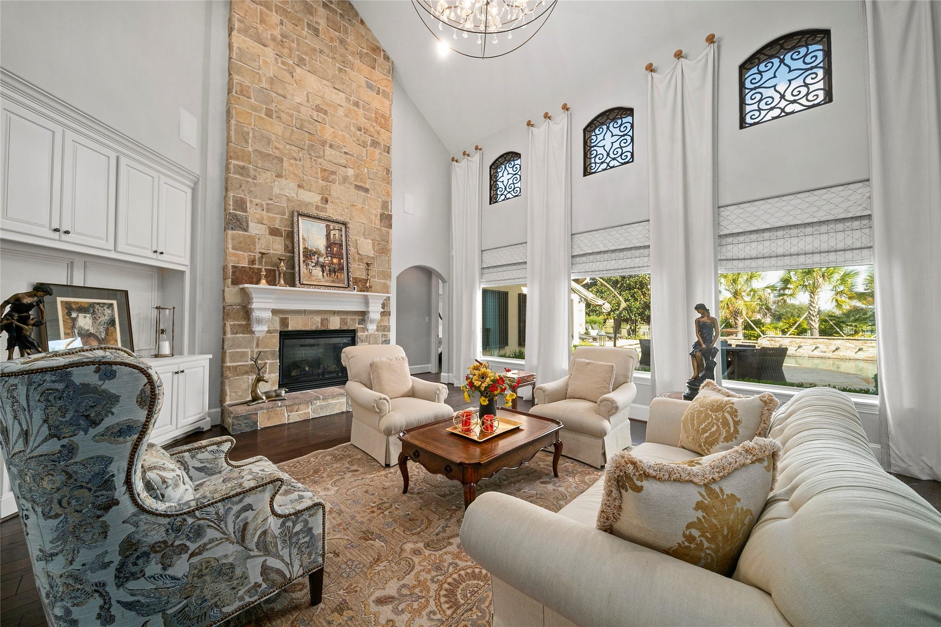 10506 Pebblecreek Crossing, Katy, TX 77494 Living room with high ceilings and natural light.