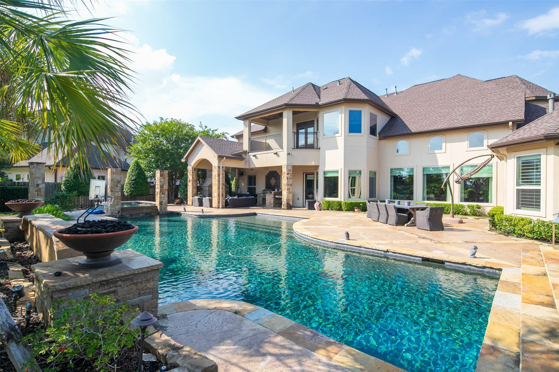 10506 Pebblecreek Crossing, Katy, TX 77494 Daytime view of the home and pool.
