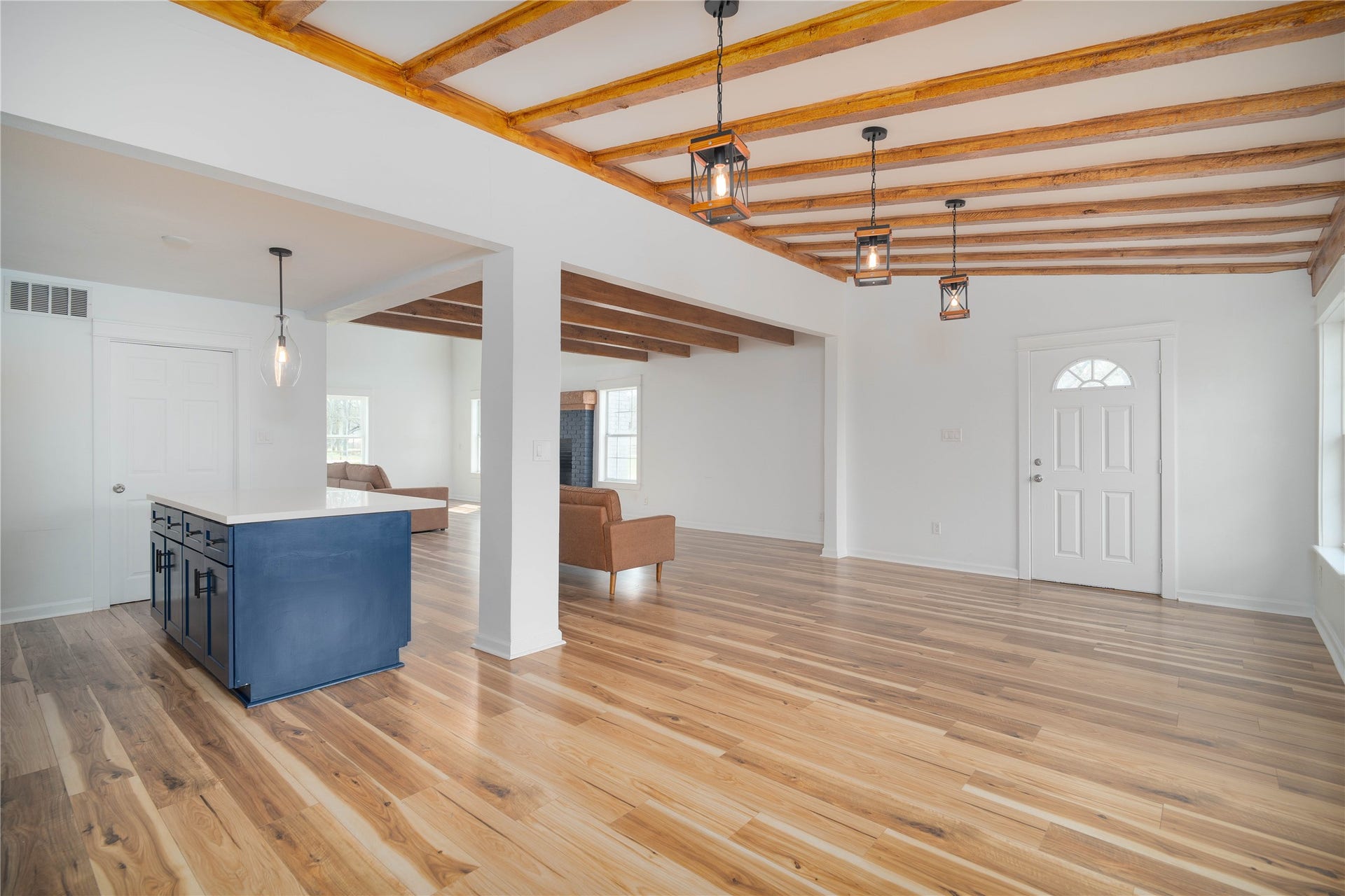 1635 Pony Lane, Wallis, TX 77485 Dining Area Dining space with exposed ceiling beams and statement pendant lighting, perfectly positioned for easy flow between kitchen and living areas.