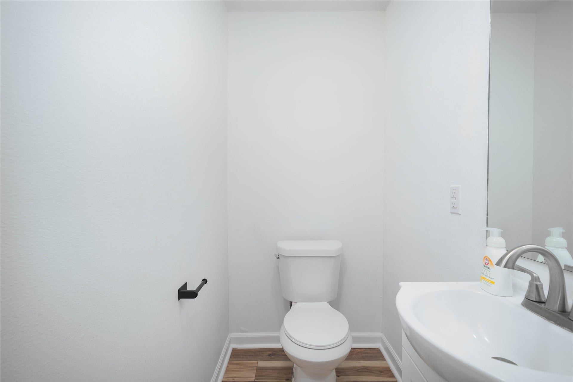1635 Pony Lane, Wallis, TX 77485 Powder Room Convenient half bath with a clean, minimalist design and pedestal-style sink.