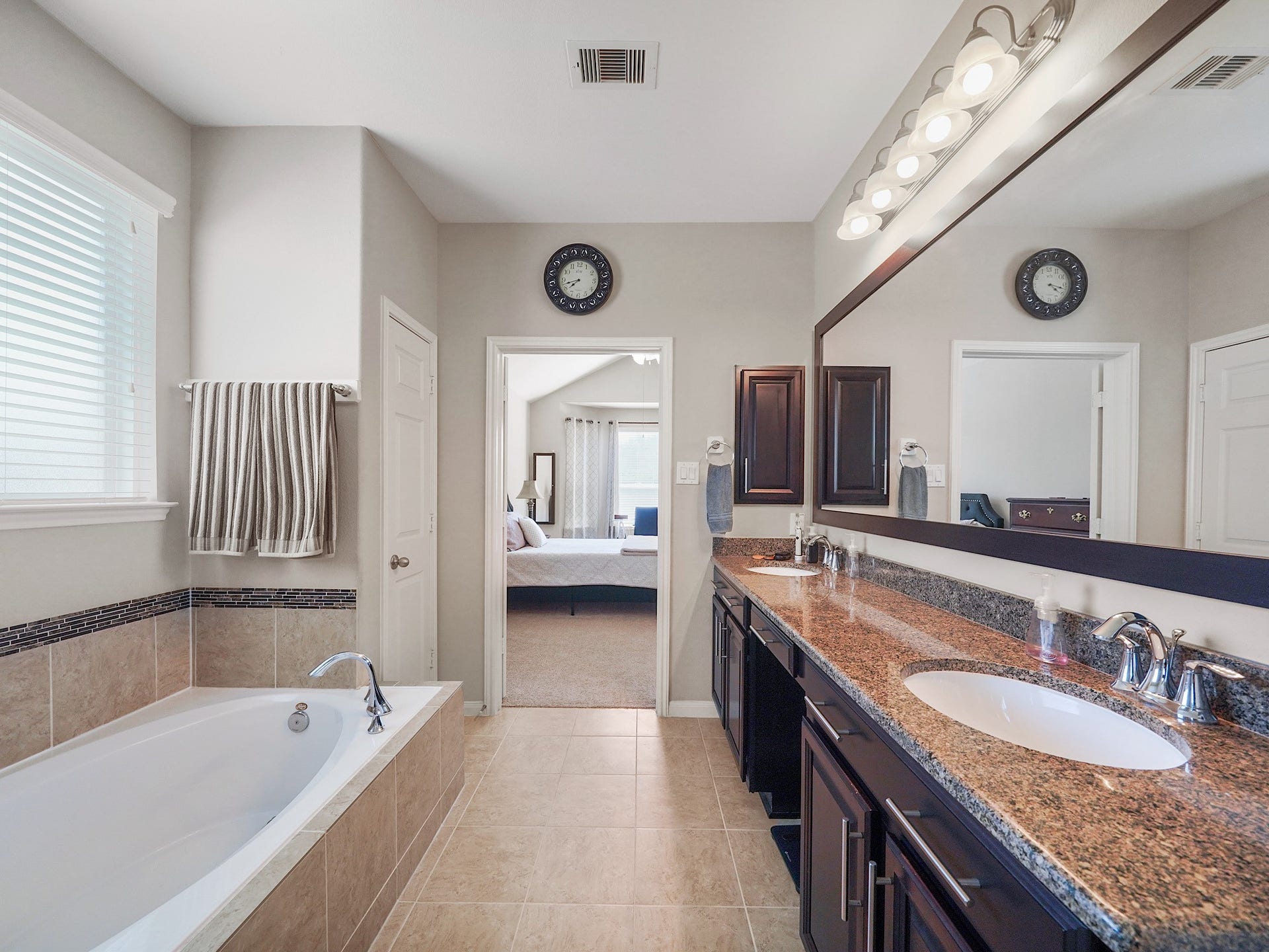 3250 Bandera Run Lane, Katy, TX 77494 The extended vanity features dual sinks, granite countertops, and plenty of storage to keep your essentials organized and within reach. With room to get ready side by side, mornings feel a little more effortless.