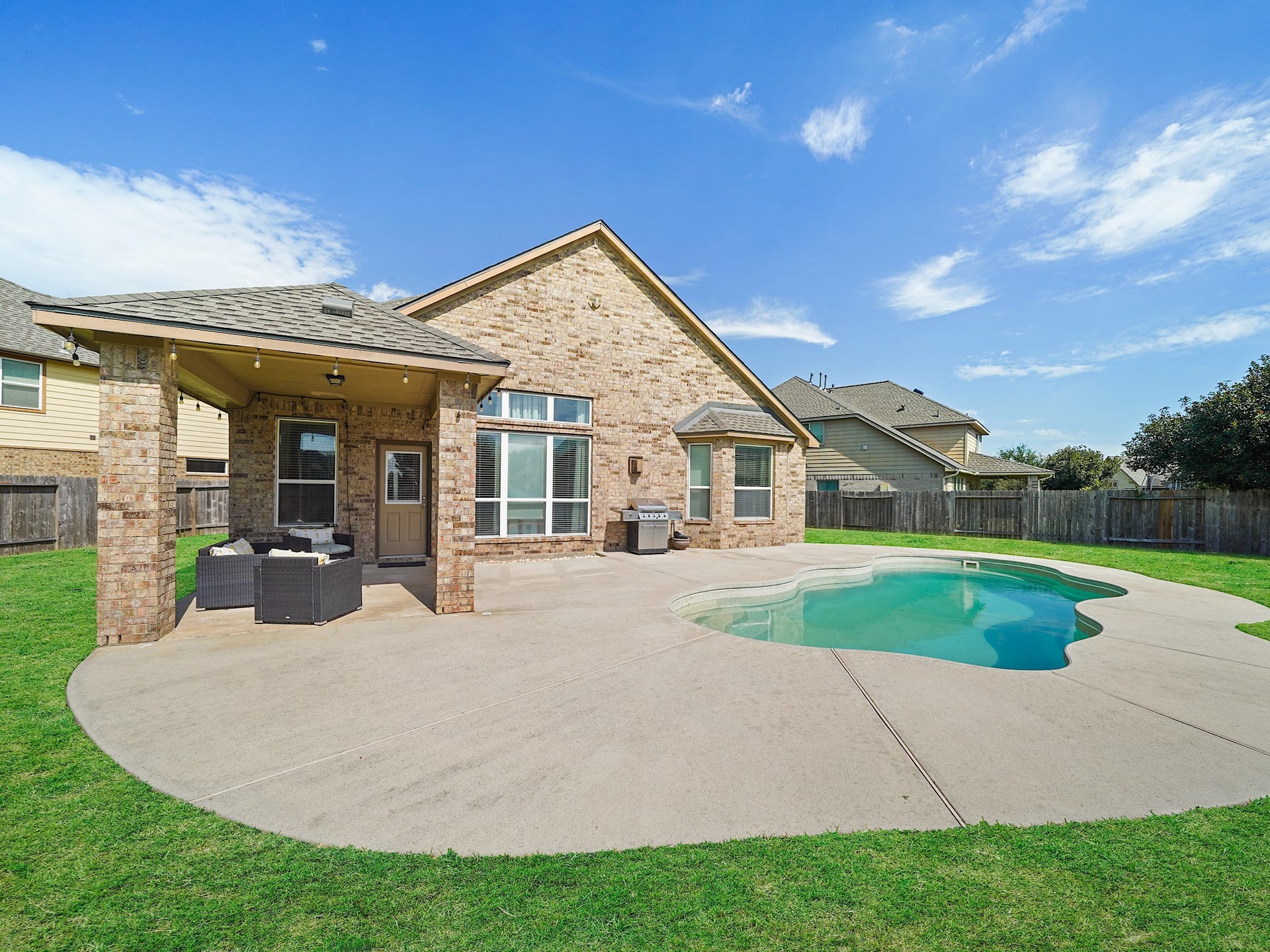 3250 Bandera Run Lane, Katy, TX 77494 The spacious backyard brings together a covered patio, private pool, and green space for a wonderful balance of relaxation and outdoor enjoyment. Whether youre hosting friends or spending a quiet afternoon at home, theres room to enjoy it all.