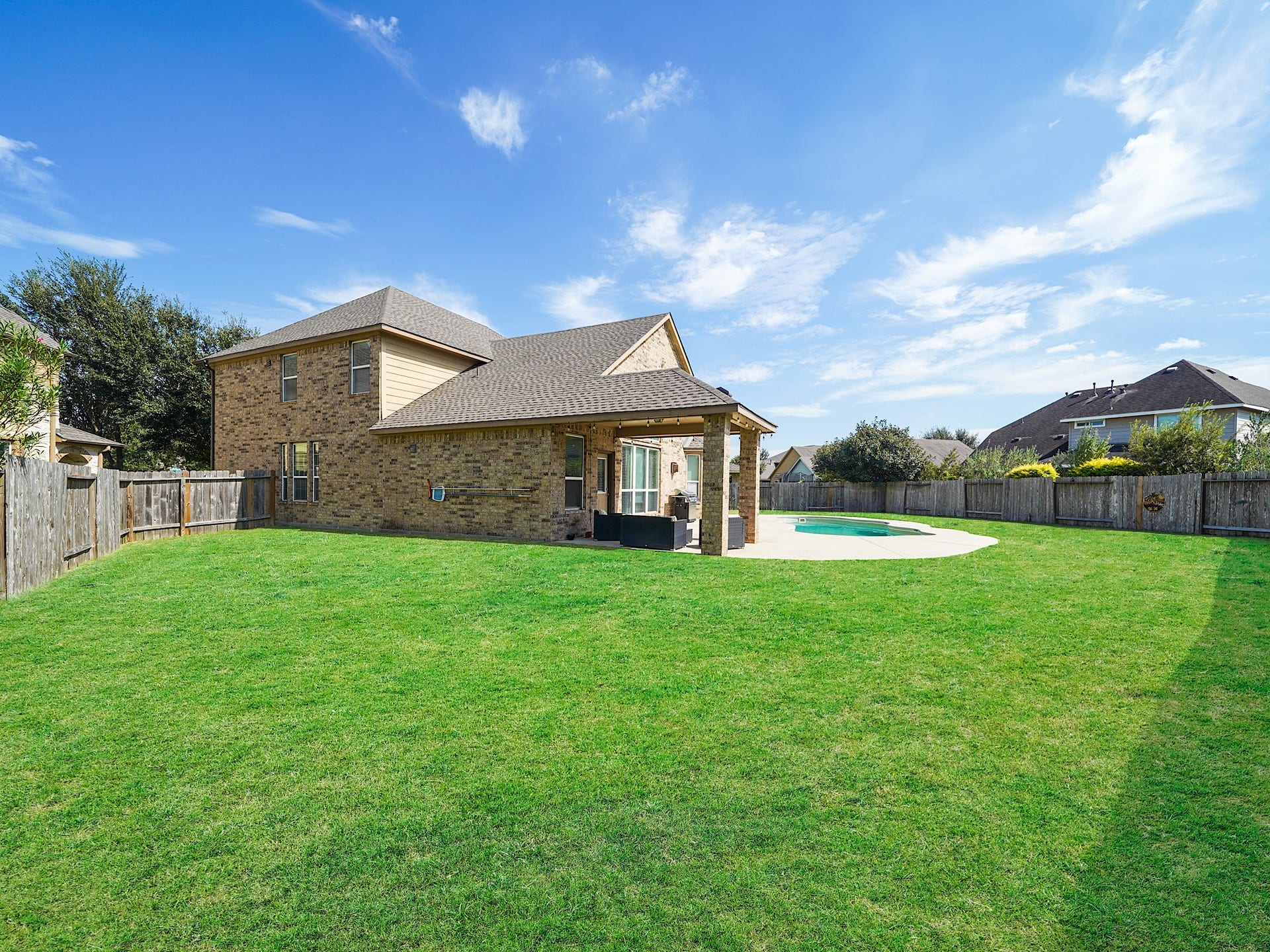 3250 Bandera Run Lane, Katy, TX 77494 With the covered patio, pool, and plenty of green space, this backyard is the perfect beginning to your dream outdoor oasis. Add your personal touch and create a place for relaxing afternoons, evenings under the stars, and gathering with the people you love.