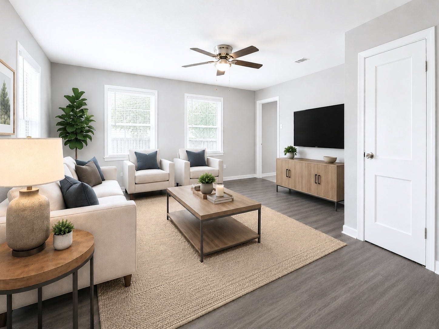 1539 Pleasantville Drive, Houston, TX 77029 Bright and inviting living room with large windows for natural light (Virtually staged)