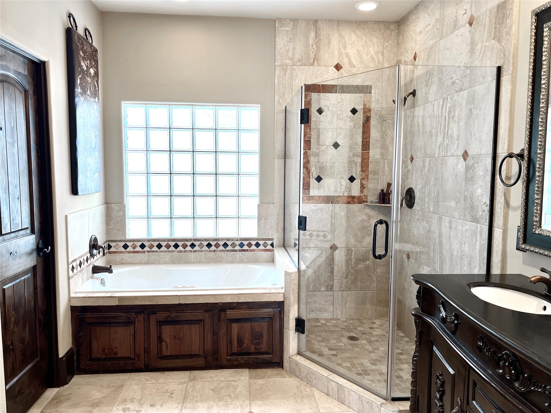 1241 W 24th Street, #C, Houston, TX 77008 Travertine shower and oil rubbed bronze fixtures.