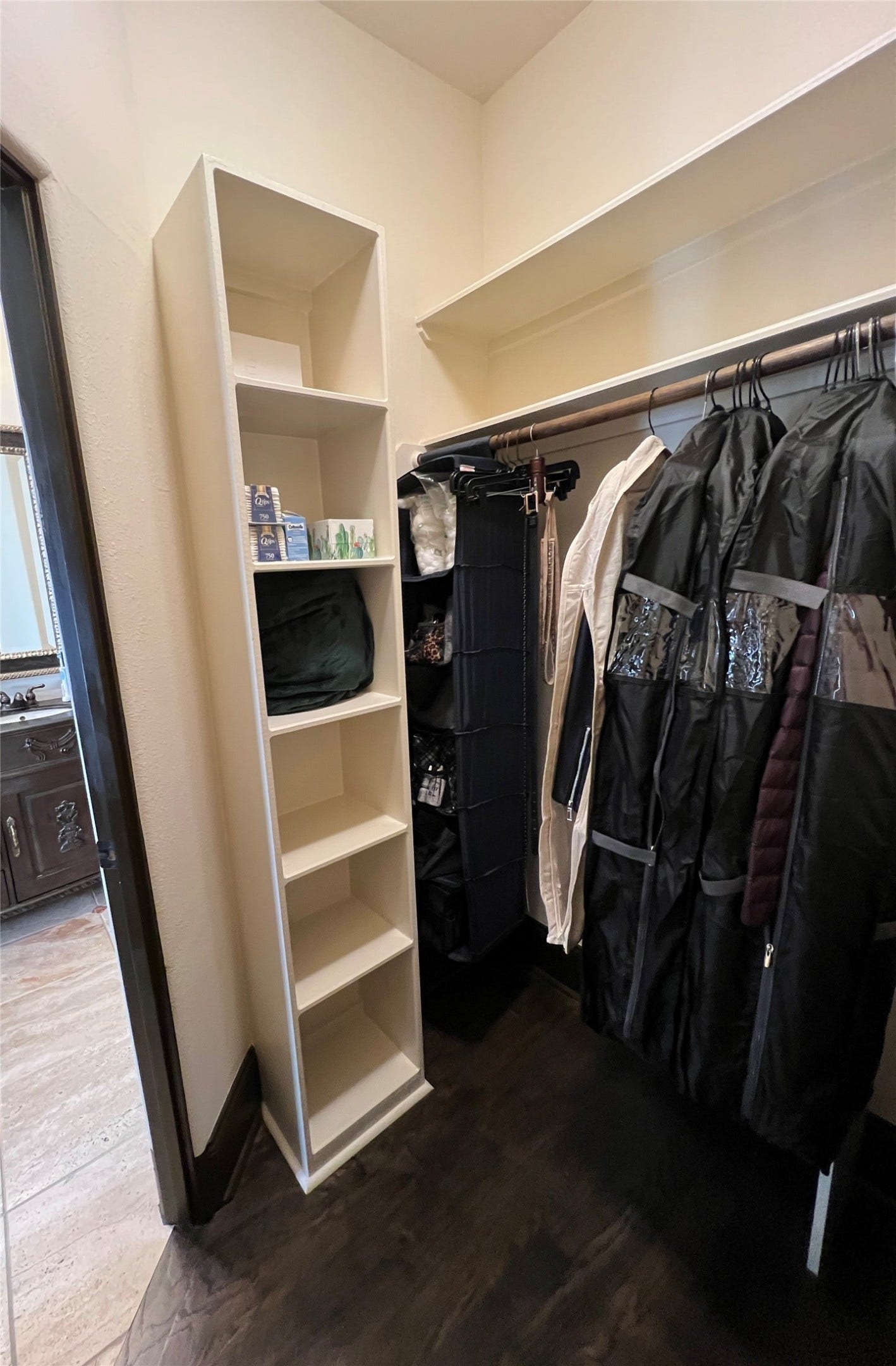 1241 W 24th Street, #C, Houston, TX 77008 1 of 2 closets in the primary suite with built in shelves.