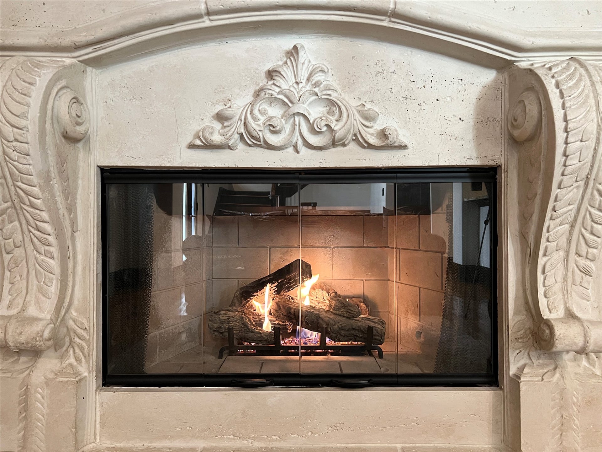 1241 W 24th Street, #C, Houston, TX 77008 Ready for cozy season! Huge limestone fireplace mantle.