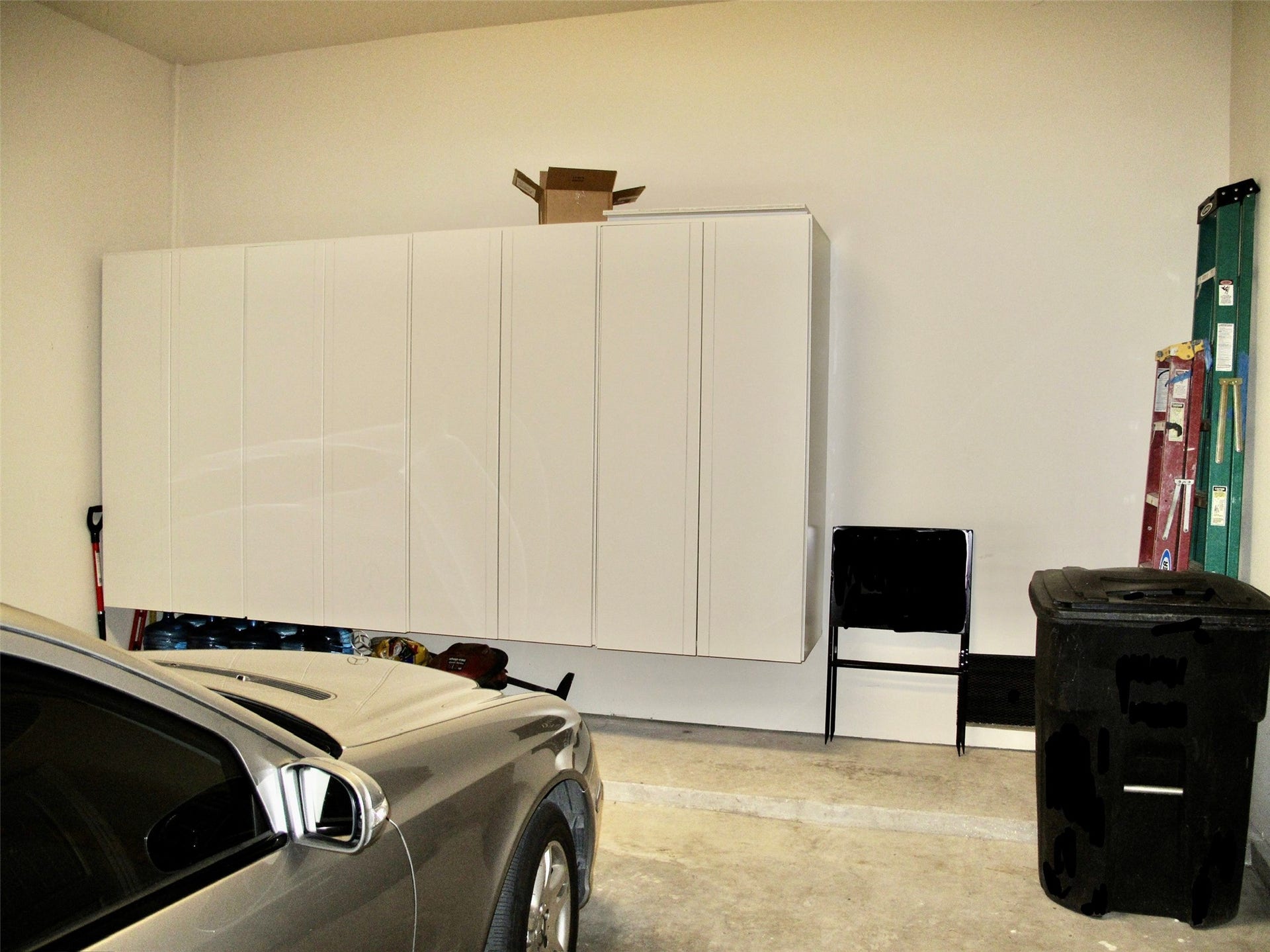 1241 W 24th Street, #C, Houston, TX 77008 Storage galore! Large storage cabinets in the garage along with two storage lofts on the ceiling, perfect for luggage storage.