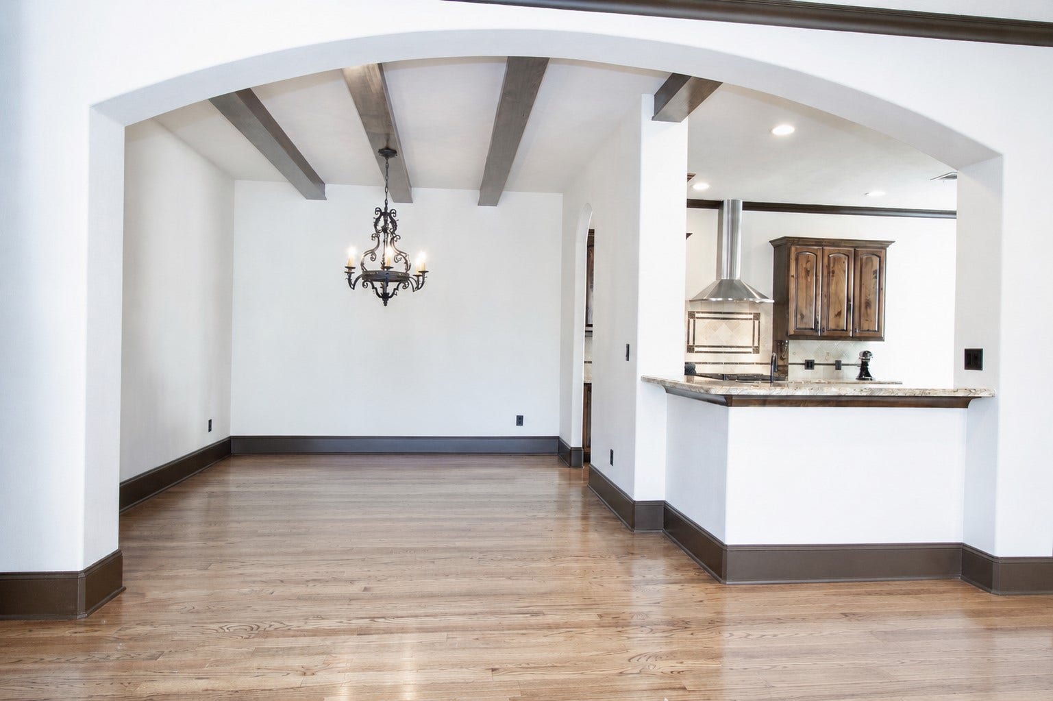 1241 W 24th Street, #C, Houston, TX 77008 Wood beams on the dining room ceiling.