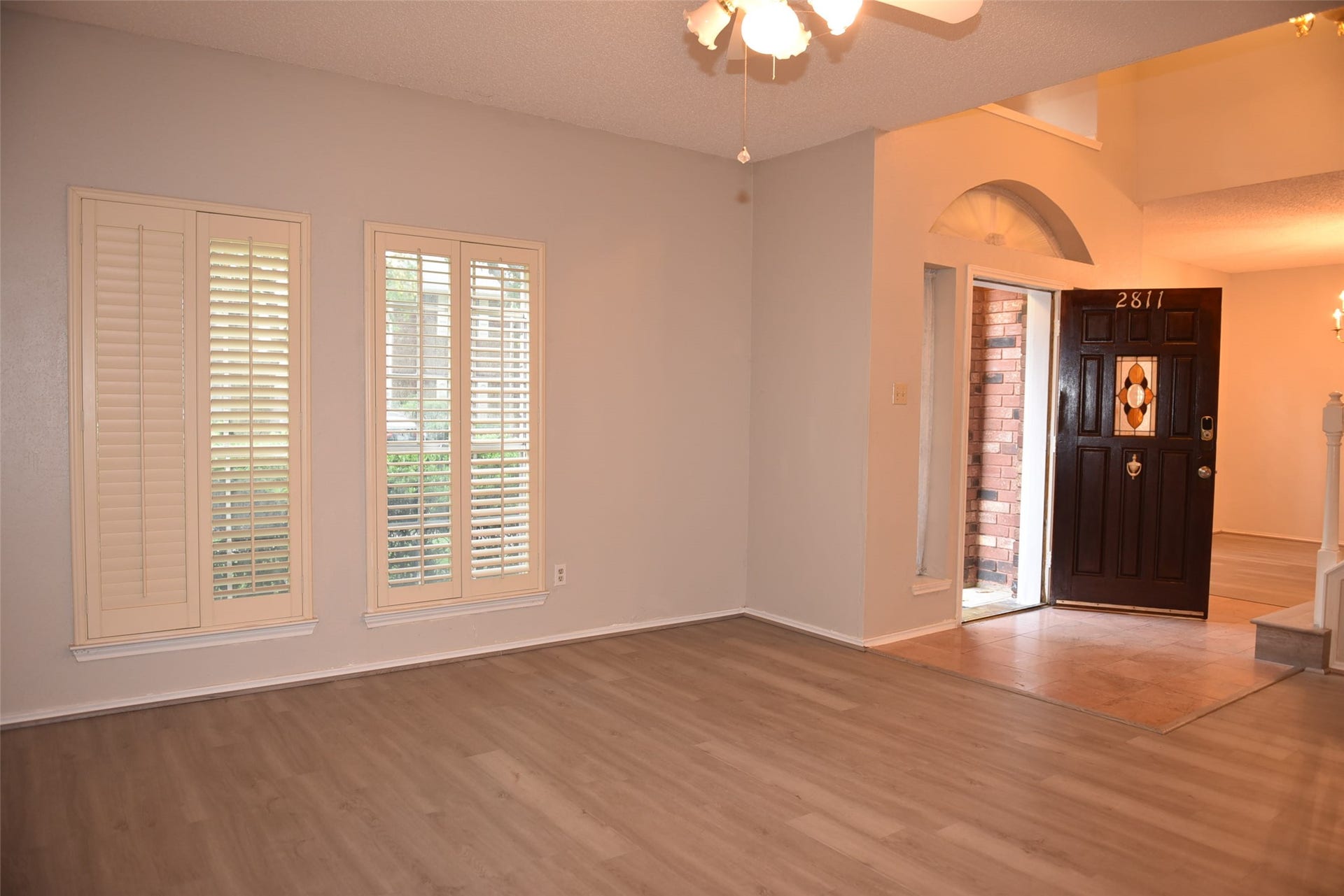 2811 Grants River Circle, Sugar Land, TX 77479 formal living room with new water prof vynyal plank floor