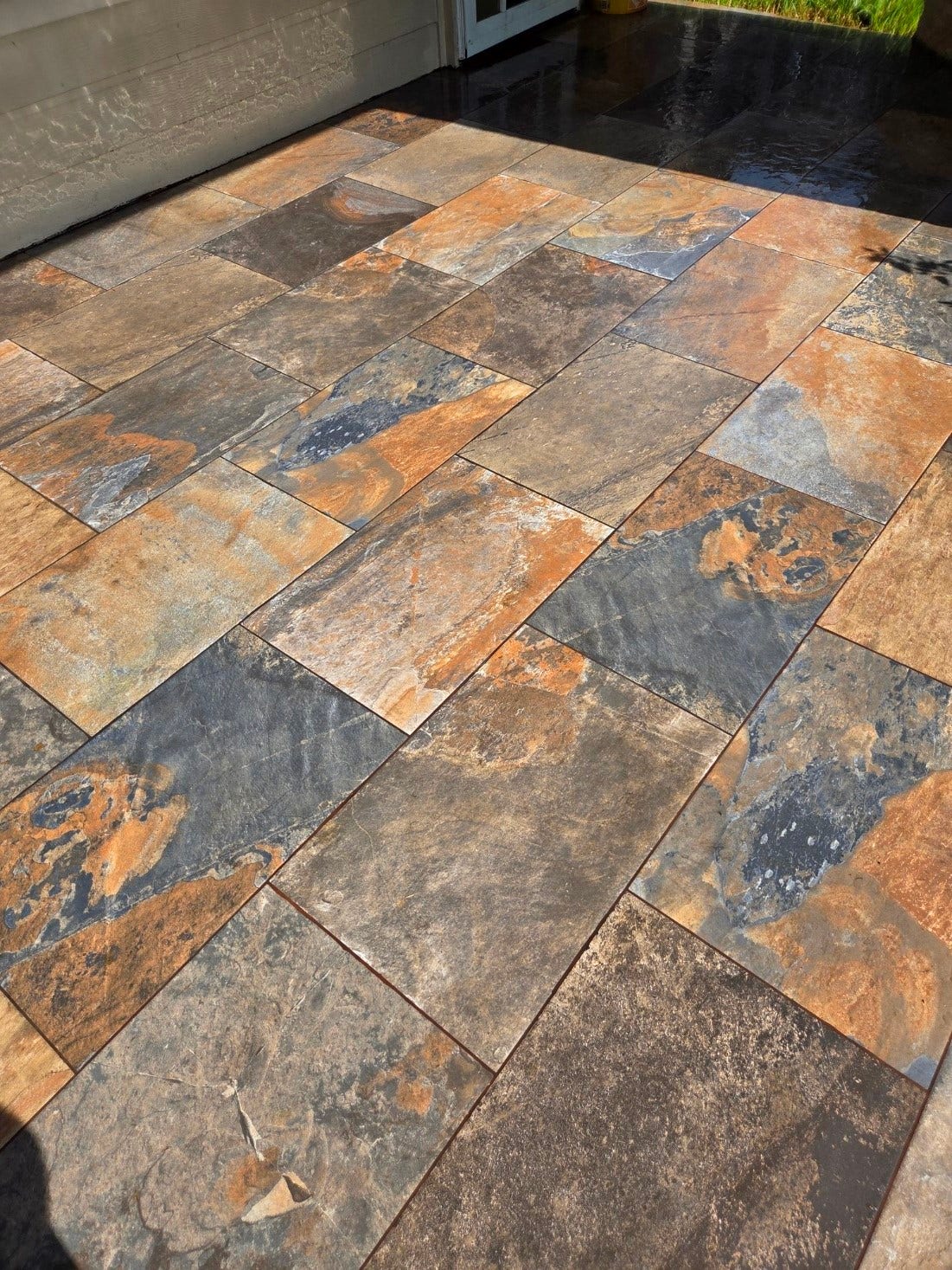 7402 Compass Rose Drive, Richmond, TX 77407 slate tile on covered patio