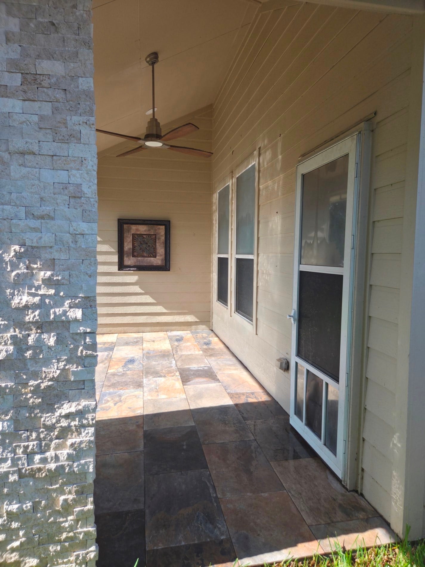 7402 Compass Rose Drive, Richmond, TX 77407 Covered patio with gas fireplace