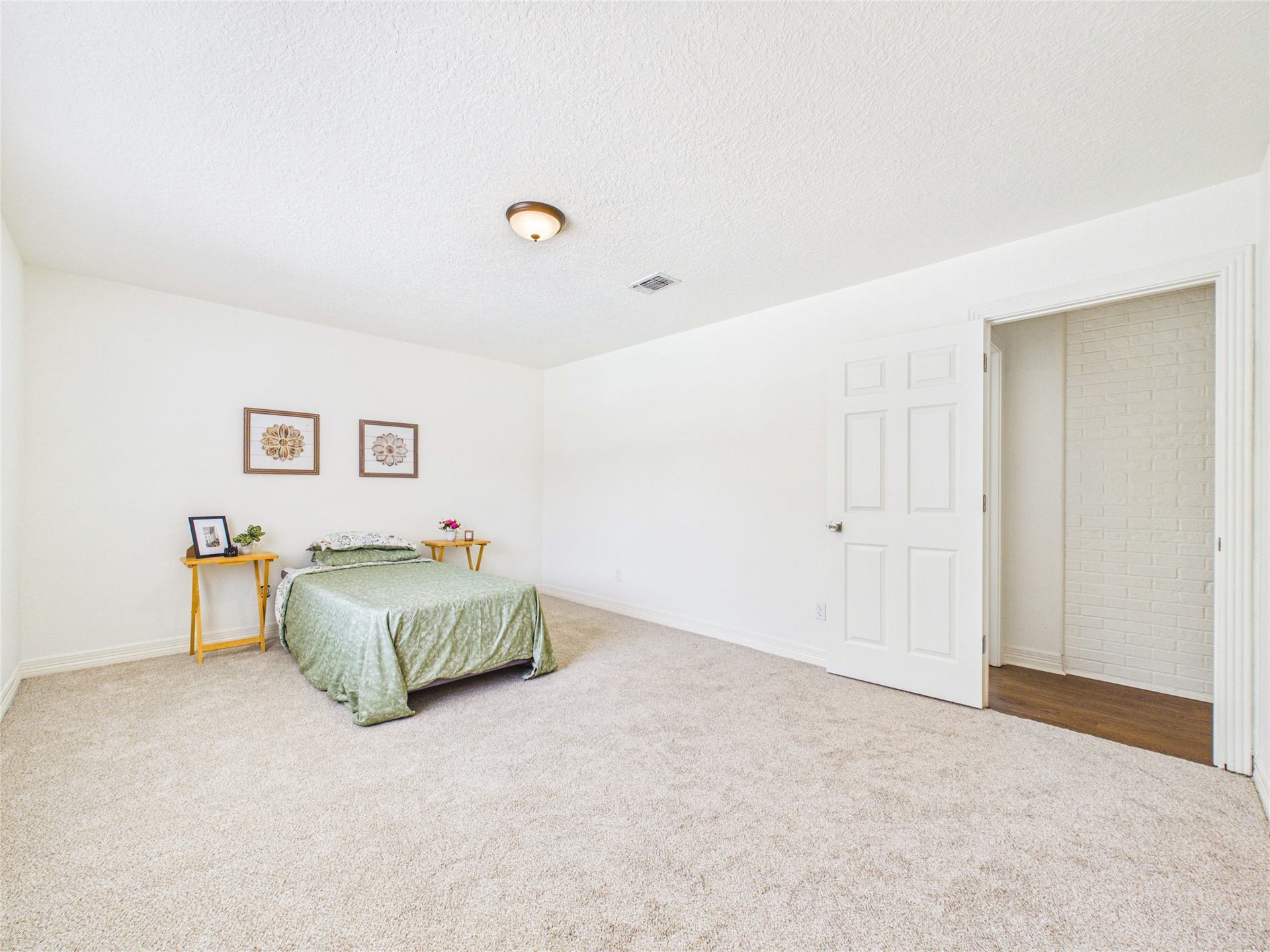 111 Cherrywood Dr, Lake Jackson, TX 77566 Secondary bedroom from corner with large walk-in closet