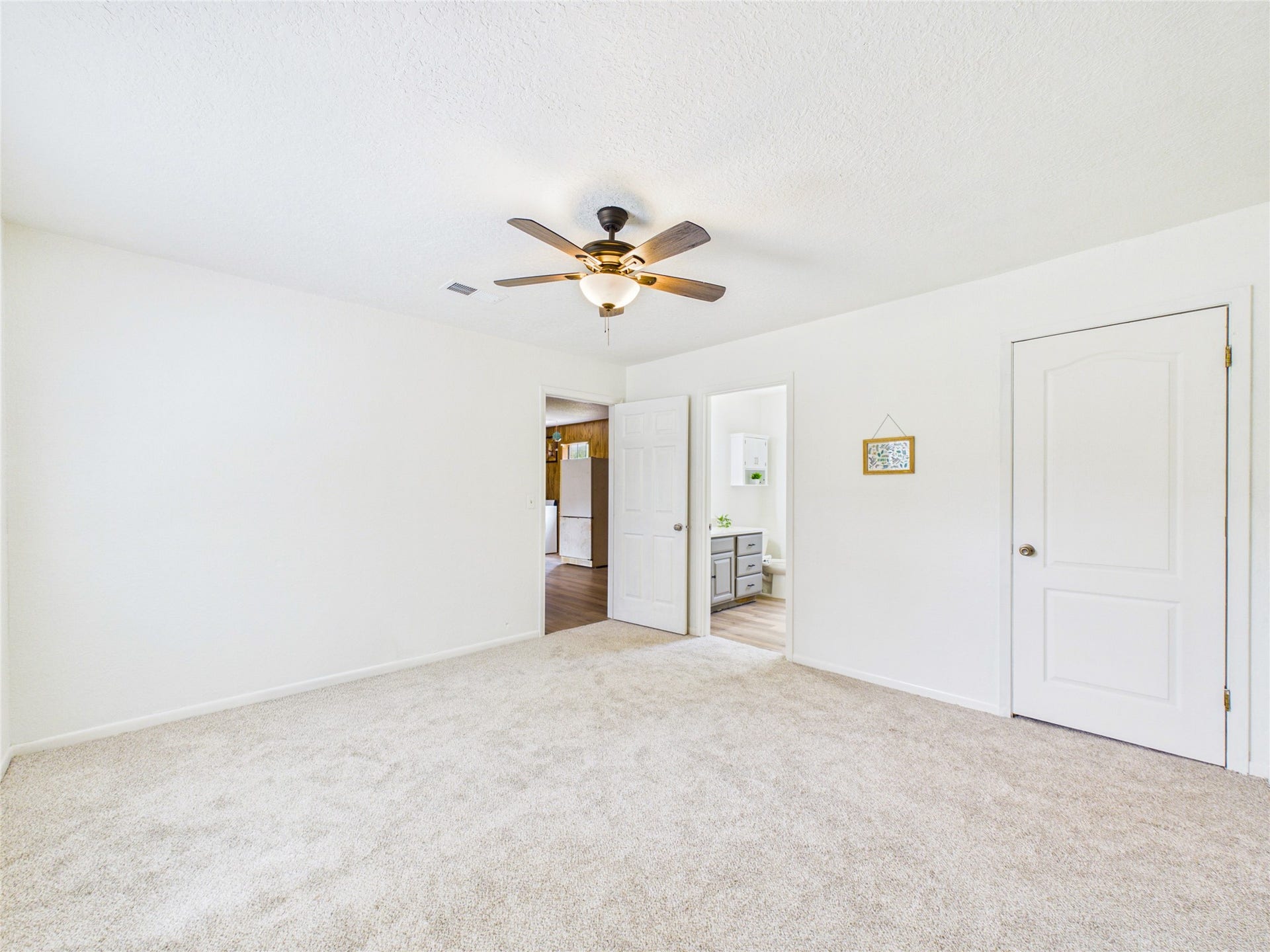 111 Cherrywood Dr, Lake Jackson, TX 77566 Bedroom in garage apt, view towards living areas and bathroom
