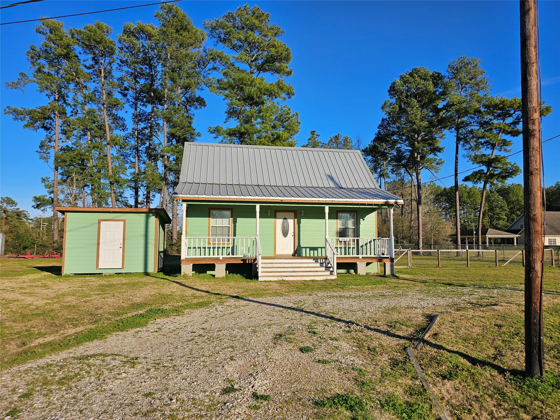 25411 T K C Road, Tomball, TX 77375 Front view of the home and front porch