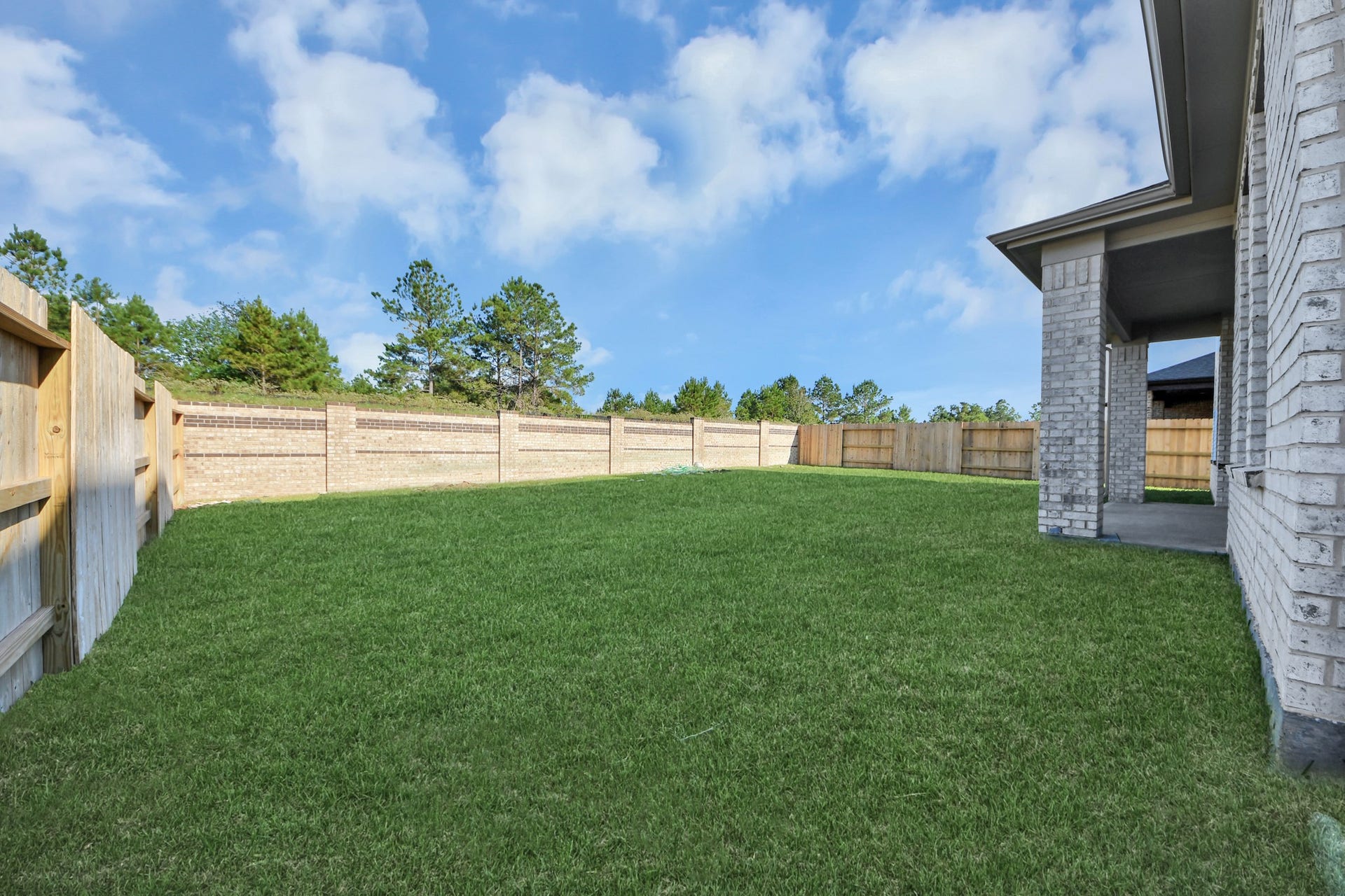 2097 Corn Thistle Way, Magnolia, TX 77355 Explore the expansive backyard with its inviting covered patioa perfect blend of space for the kids to play and adults to unwind. Ideal for creating your outdoor oasis, this backyard accommodates patio furniture, a BBQ pit, and endless possibilities for leisure and entertainment.