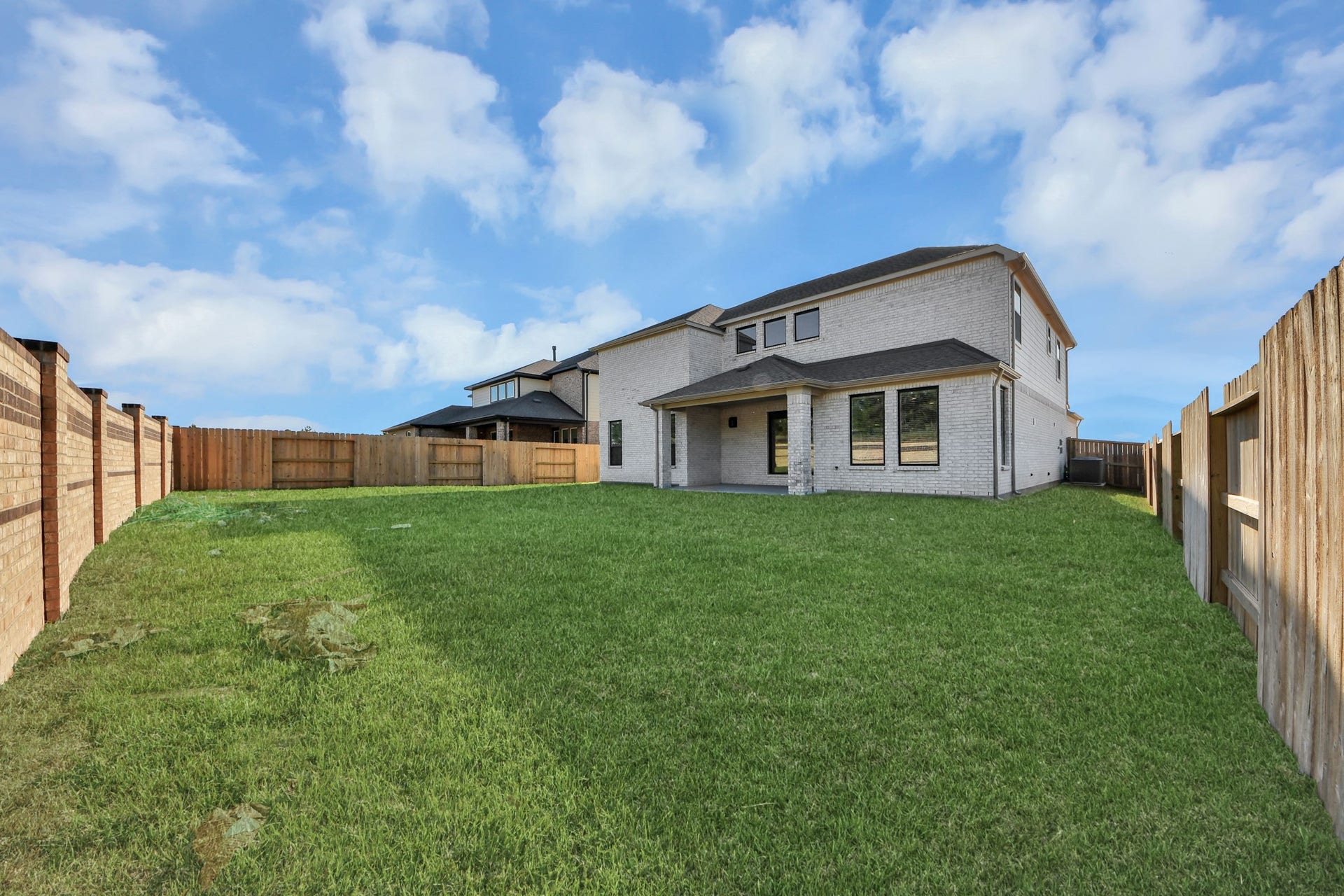 2097 Corn Thistle Way, Magnolia, TX 77355 Come and see this spacious backyard with its beautiful covered patio. There is plenty of room for the kids to play and adults to relax. Perfect for your outdoor living space, patio furniture, bbq pit, and so much more. The possibilities are endless!