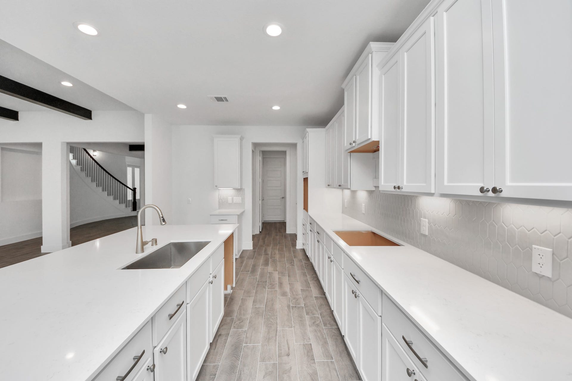 2097 Corn Thistle Way, Magnolia, TX 77355 All of this overlooks your expansive family room, creating a perfect space for culinary delights and family gatherings.