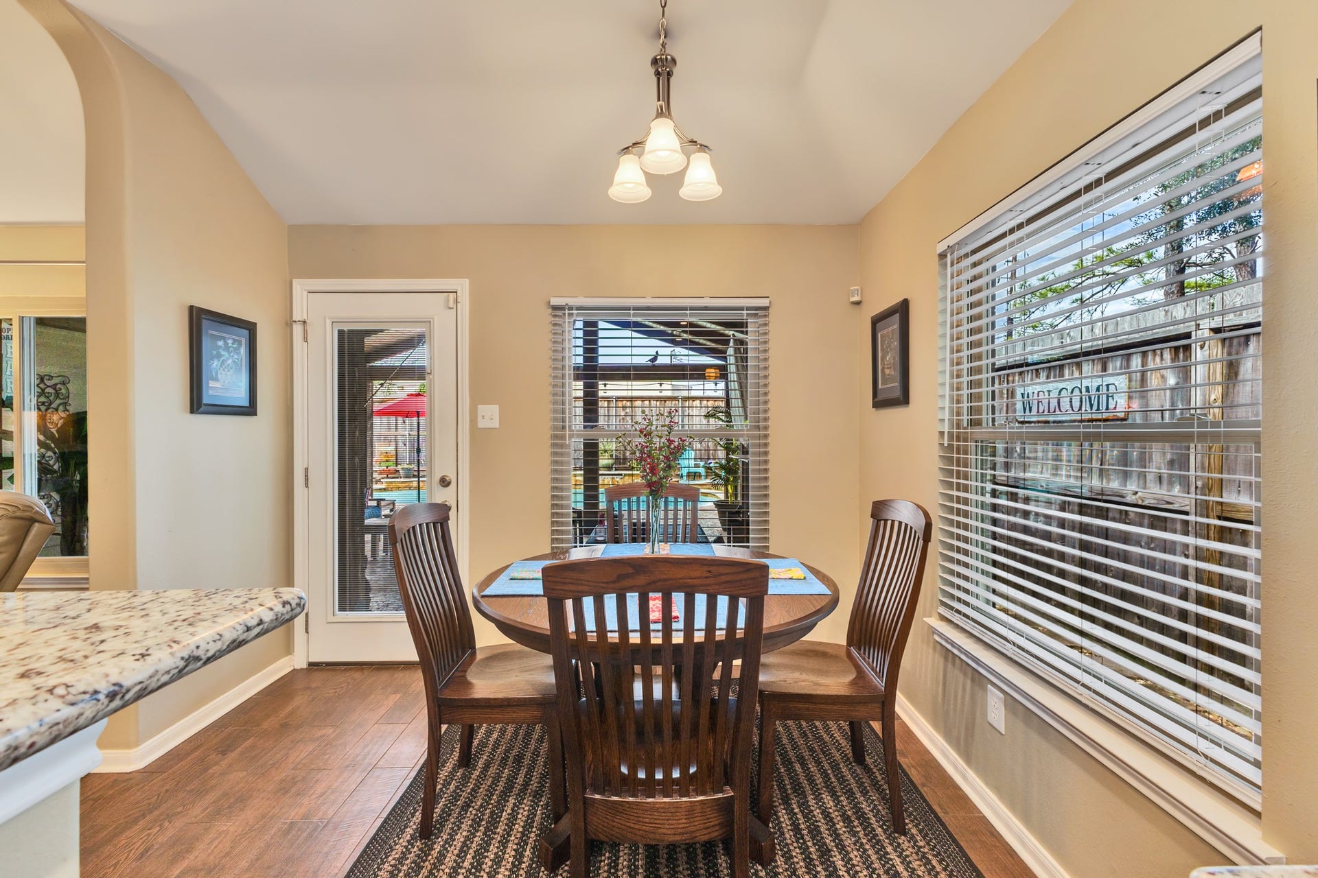 3502 Pecan Mill Drive, Sugar Land, TX 77498 Breakfast eat in area with a door to the pool area.
