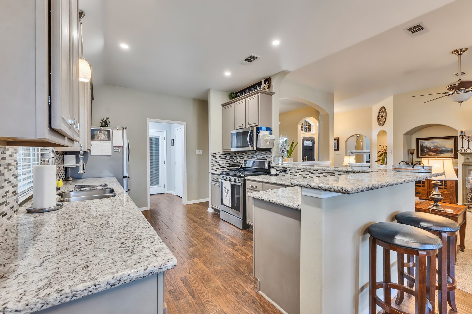 3502 Pecan Mill Drive, Sugar Land, TX 77498 Flooring is wood look tile.