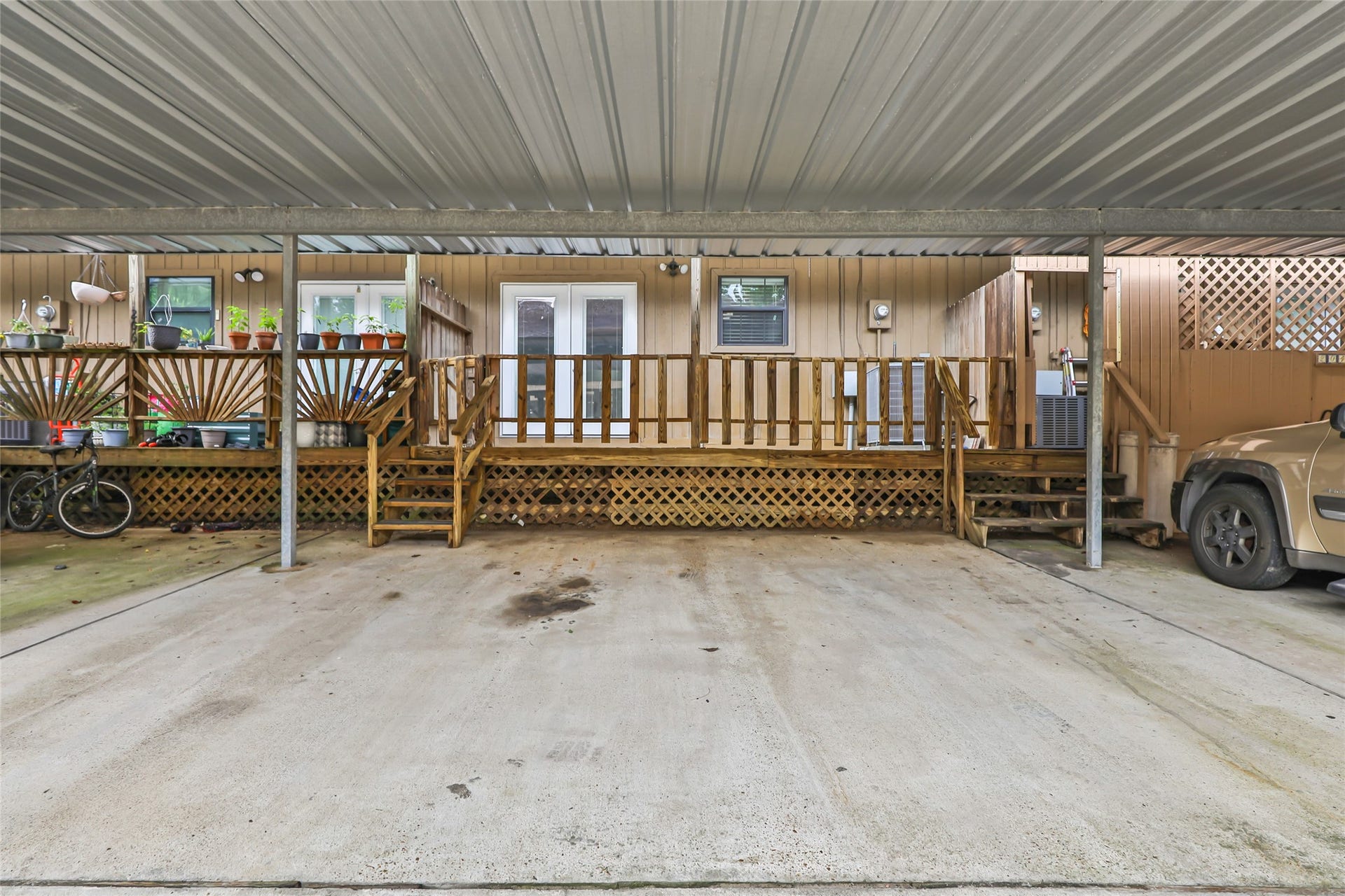 1011 Hamblen Road, #205, Kingwood, TX 77339 Two car carport