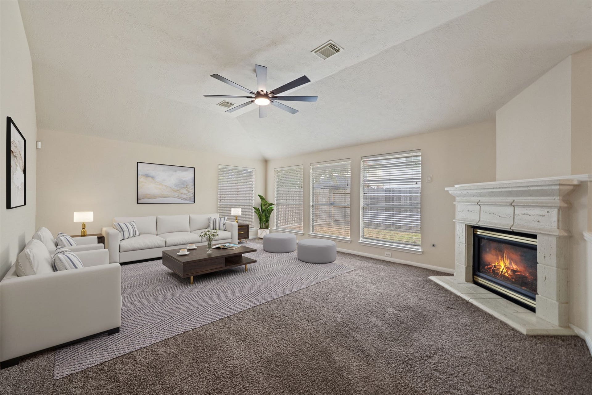 10902 Trail Ridge Drive, Houston, TX 77064 Spacious and inviting living room with abundant natural light and a cozy fireplace, offering a perfect blend of comfort and modern elegance. *virtually staged