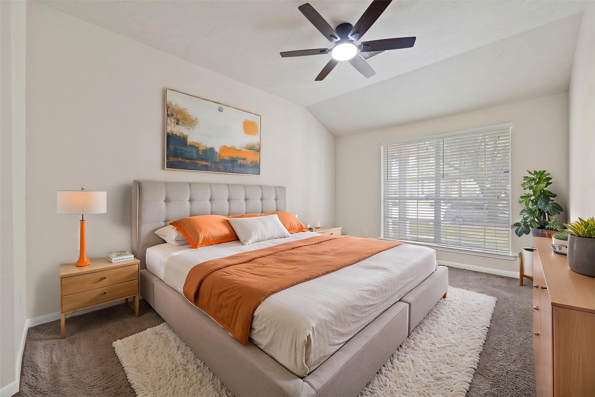 10902 Trail Ridge Drive, Houston, TX 77064 4th bedroom featuring a modern ceiling fan and abundant natural light streaming through a large window. *virtually staged