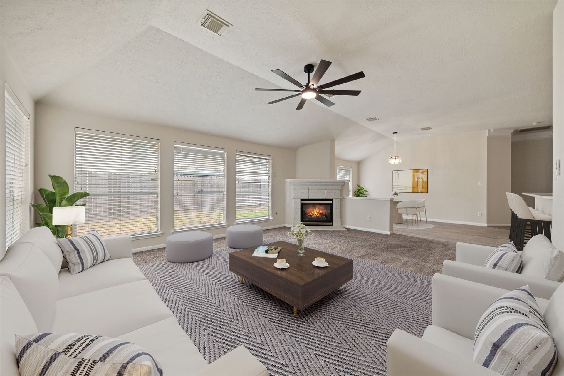 10902 Trail Ridge Drive, Houston, TX 77064 Huge den with abundant natural light, a fireplace, perfect for relaxation and entertaining. *virtually staged