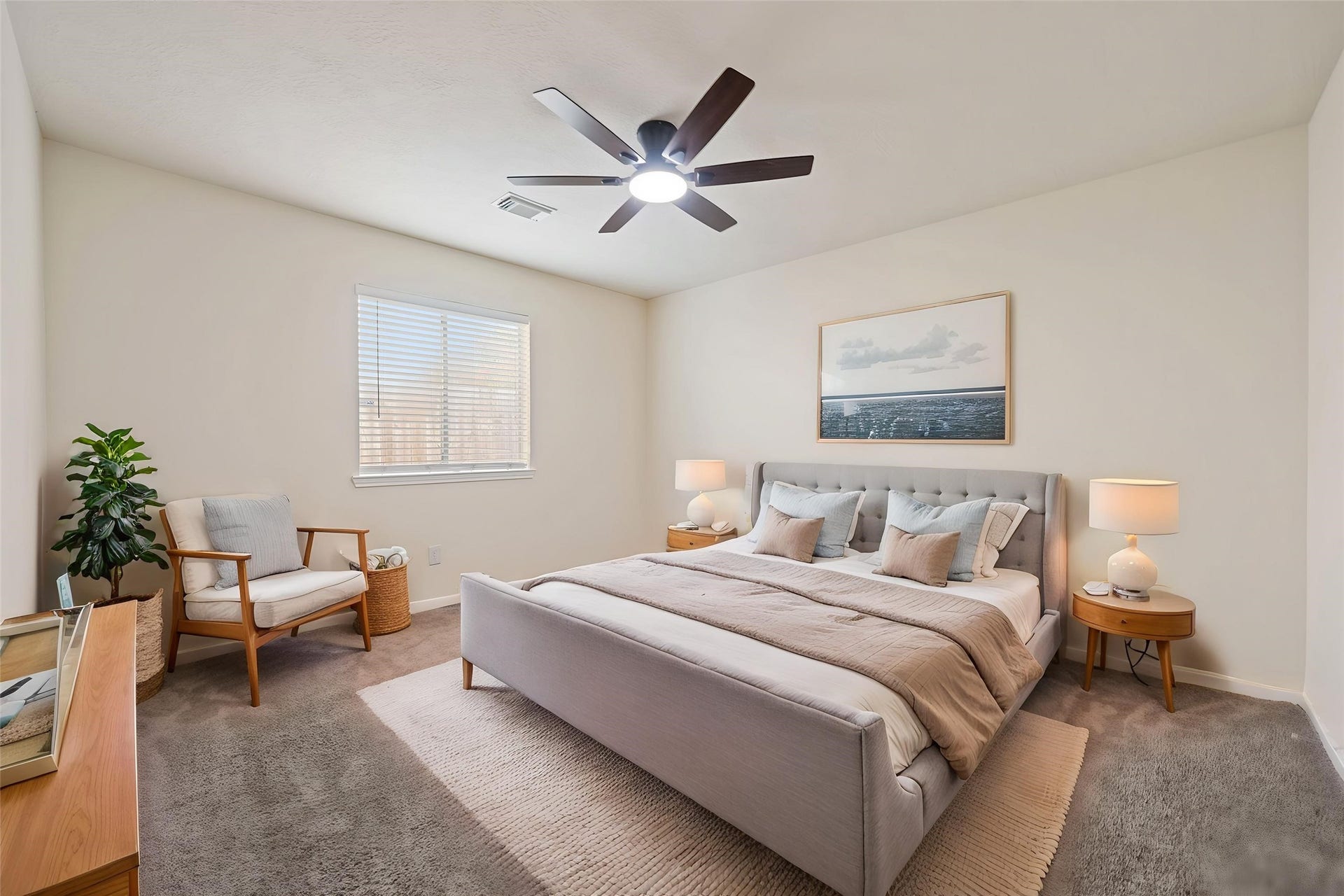 10902 Trail Ridge Drive, Houston, TX 77064 One of the secondary bedrooms with carpet, a modern ceiling fan, and natural light *virtually staged
