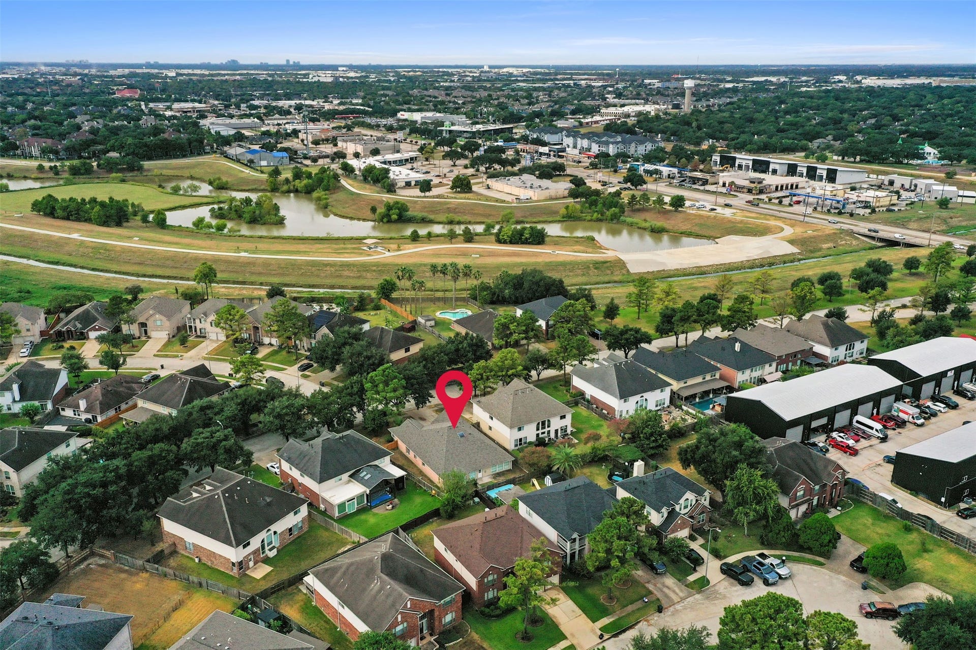 10902 Trail Ridge Drive, Houston, TX 77064 Charming neighborhood setting with well-maintained homes, surrounded by lush greenery, offering a serene suburban lifestyle with convenient access to local amenities.