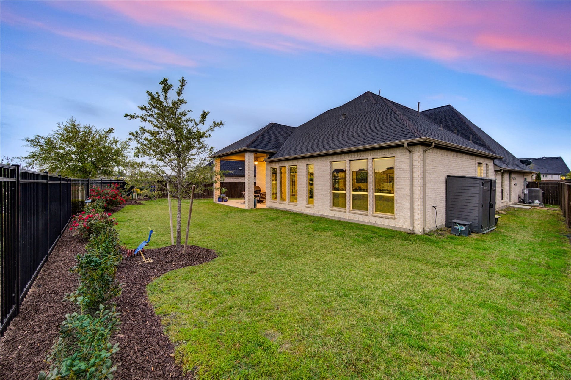 The backyard truly offers the best of both worlds  a beautiful space for entertaining and a tranquil setting for private relaxation. Plent of room to install a pool!