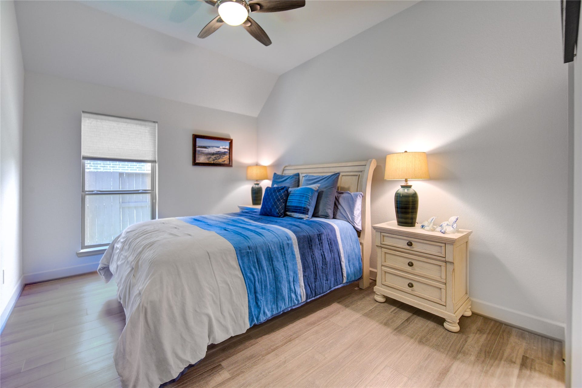 Guest & Family Bedrooms: The secondary bedrooms offer ample space, each featuring Luxury Vinyl Floors, high ceilings, ceiling fans, and large closets.