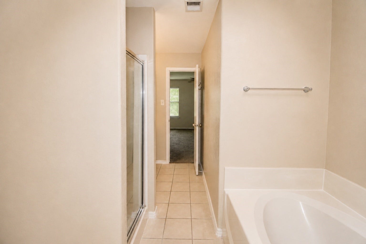 5727 Rose Rock Canyon Drive, Richmond, TX 77469 Primary bath features a soaking tub and separate shower!