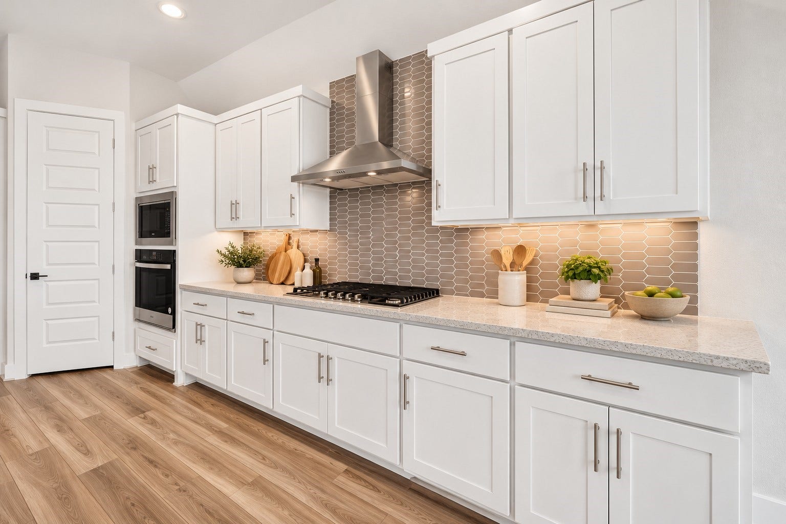 16270 Blue Mistflower Lane, Hockley, TX 77447 Kitchen Designer Details: Beautifully appointed kitchen featuring a gas cooktop, stainless steel vent hood, decorative tile backsplash, illuminated cabinetry, and generous countertop space that combines elegance with everyday functionality.