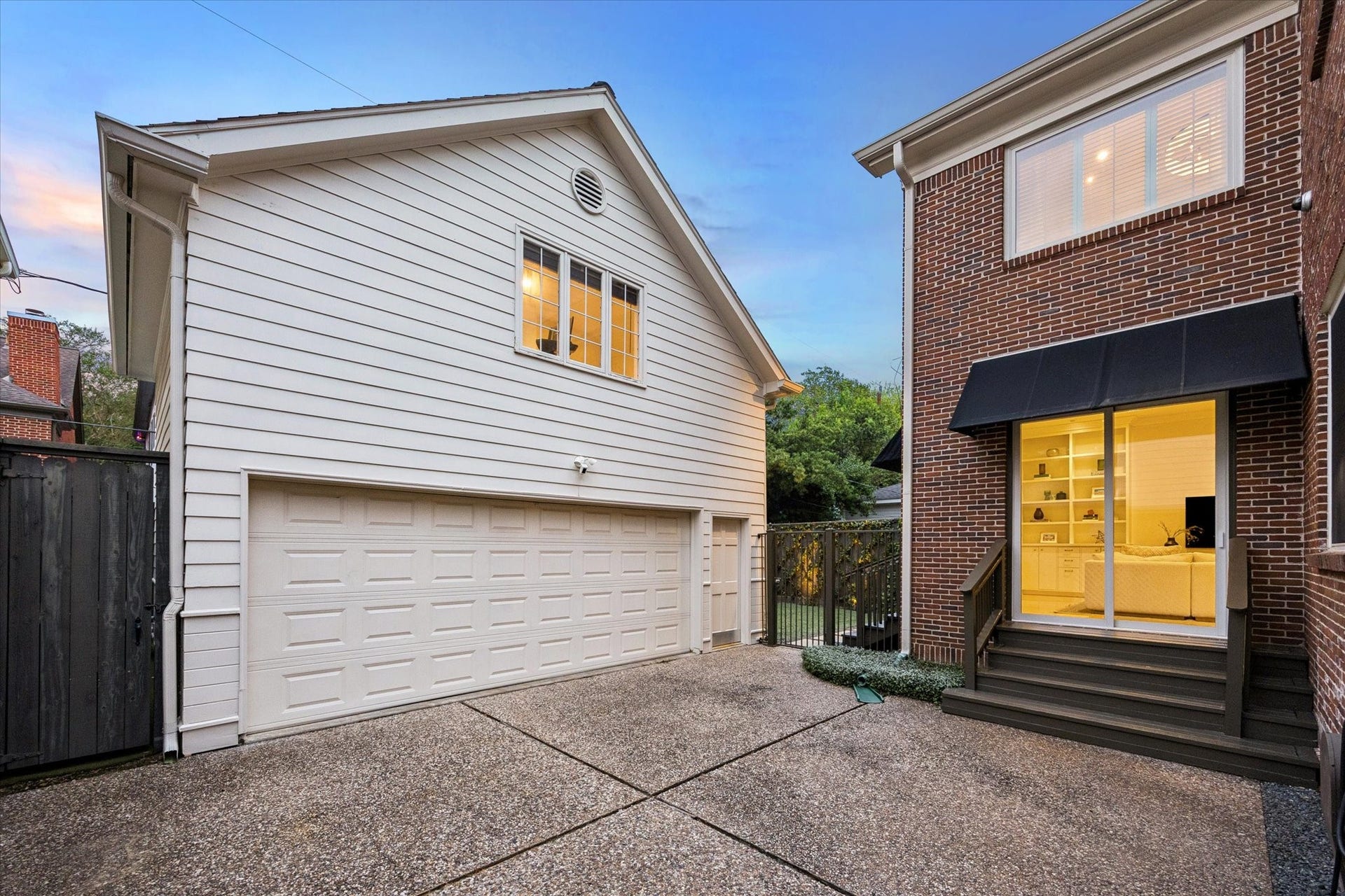 Versatile garage apartment with a full bathroom, air conditioning, and an exceptionally large storage area.
