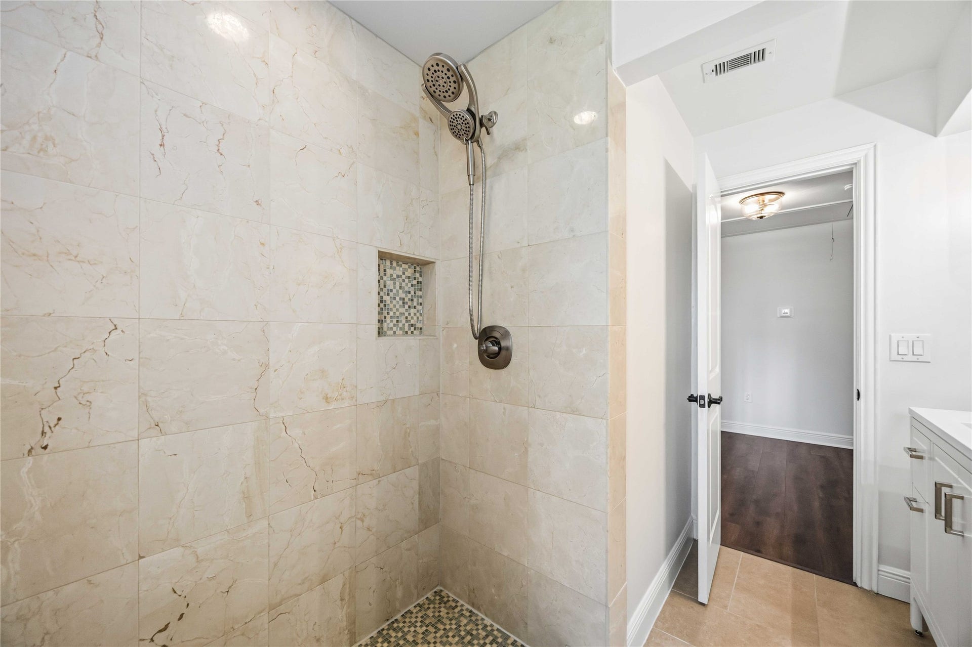 5722 N Braeswood Boulevard, Houston, TX 77096 Updated primary bath w/ stand-up shower!