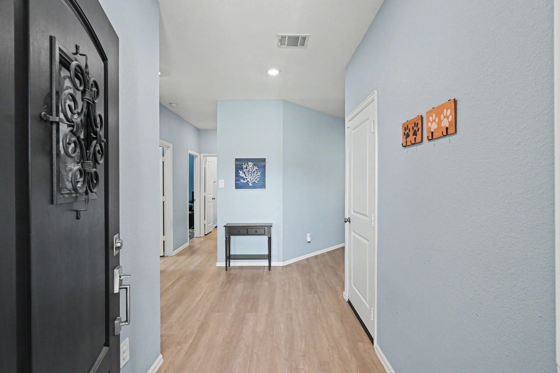 Welcome in. Living space to the right. Bedrooms to the left