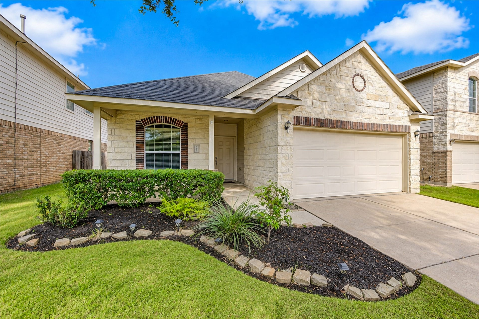 6030 Starbrook Creek Drive, Katy, TX 77494 Beautiful natural white stone!